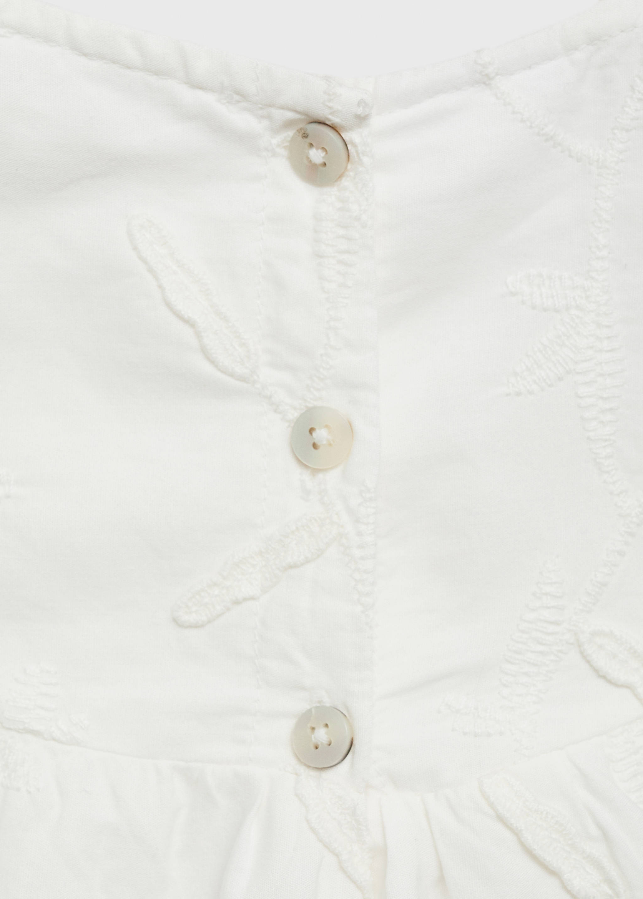 Kleid mit Blumenstickerei - Detail des Artikels 8