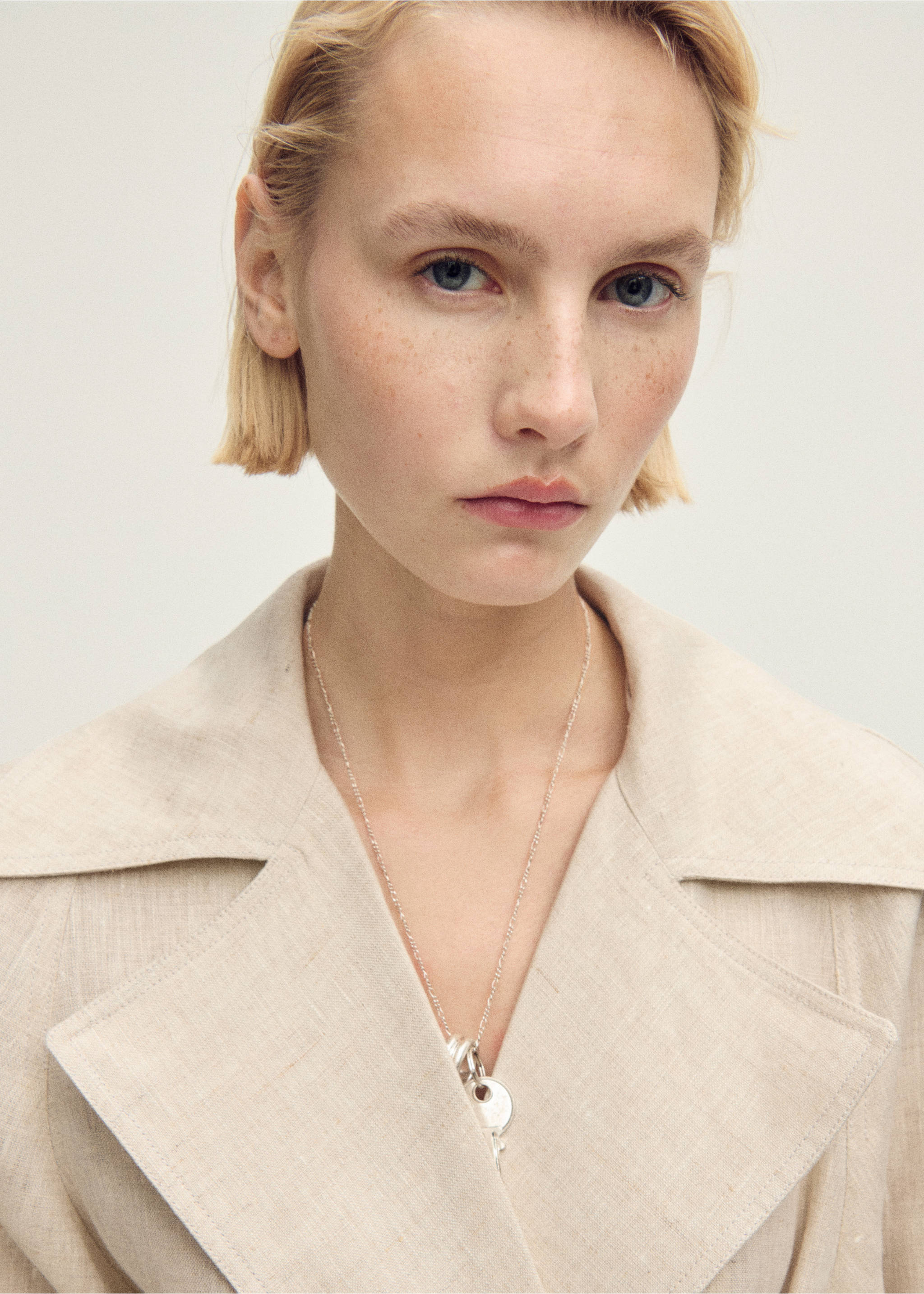 Linen trench coat with pronounced lapels - Details of the article 1, Light/Pastel Grey. Ref: 87057680-00.