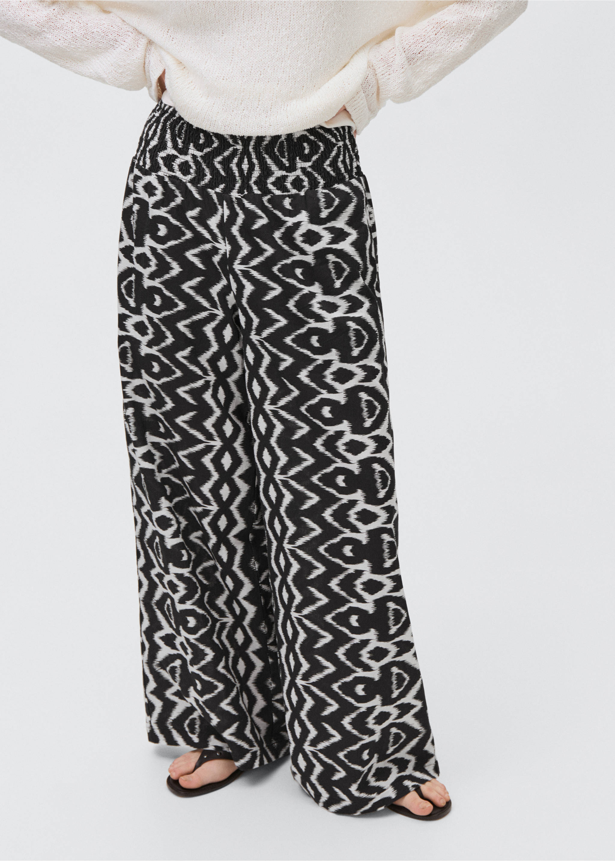 Calças retas estampadas - Plano médio, Preto. Ref: 87057692-00.