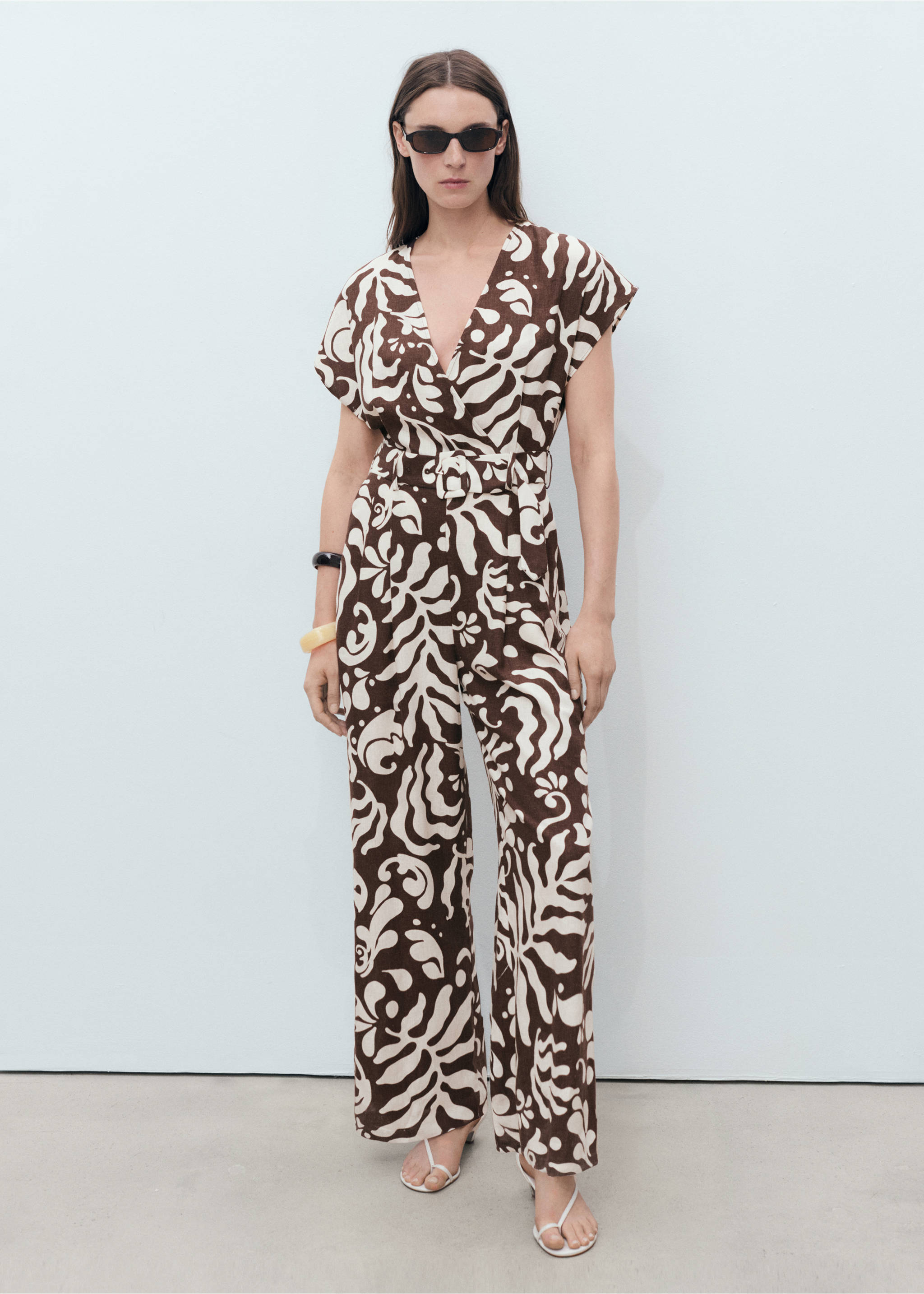 Printed linen jumpsuit with belt - General plane, Brown. Ref: 87058647-00.