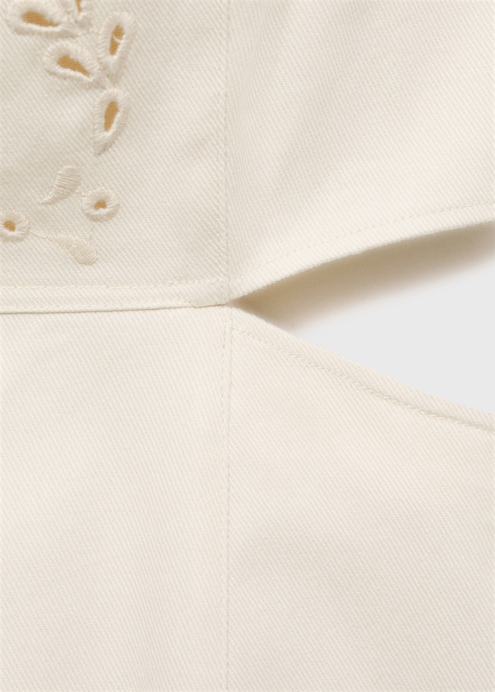 Dress with openwork details and openings - Details of the article 0