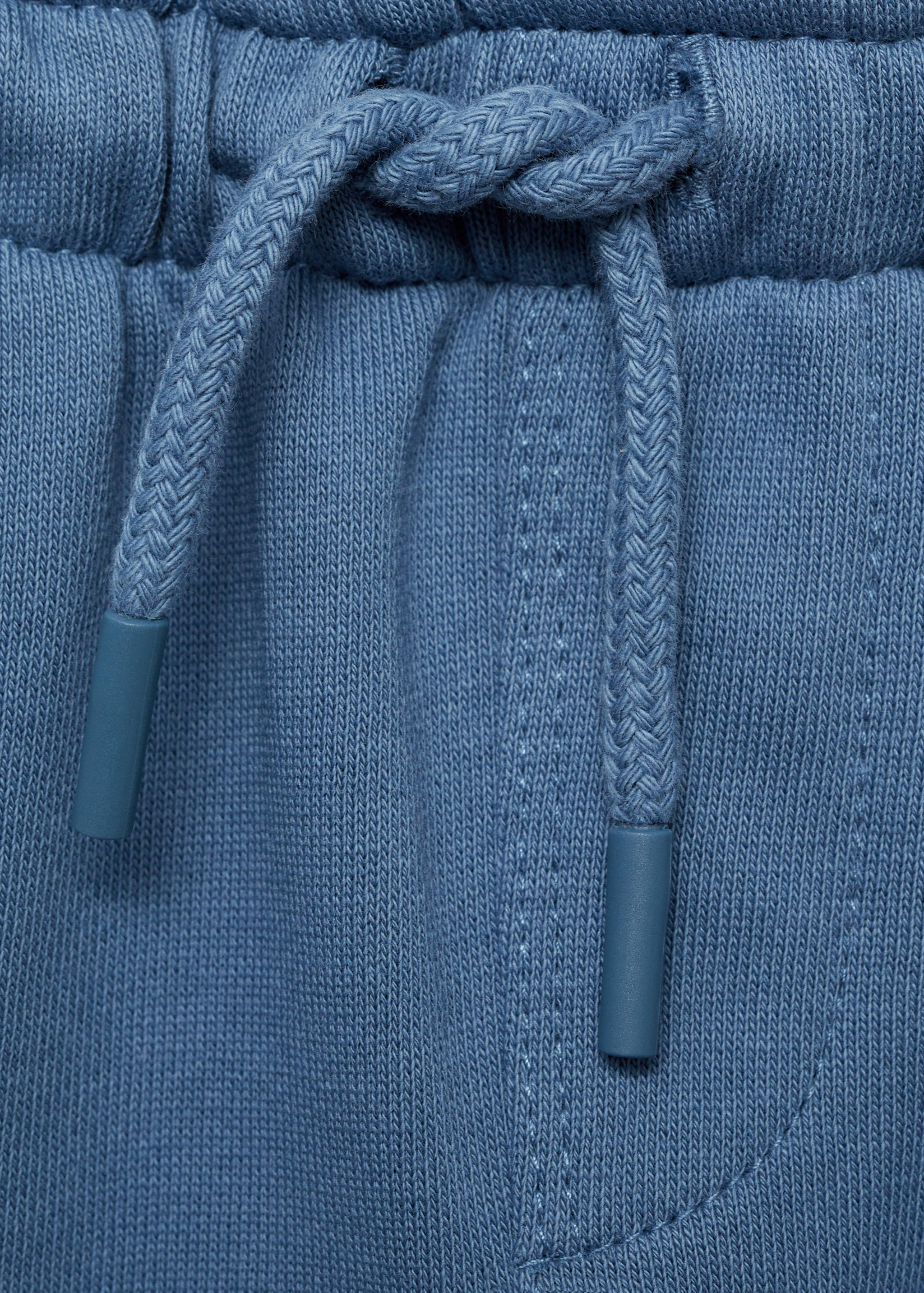 Cotton jogger-style trousers - Details of the article 8