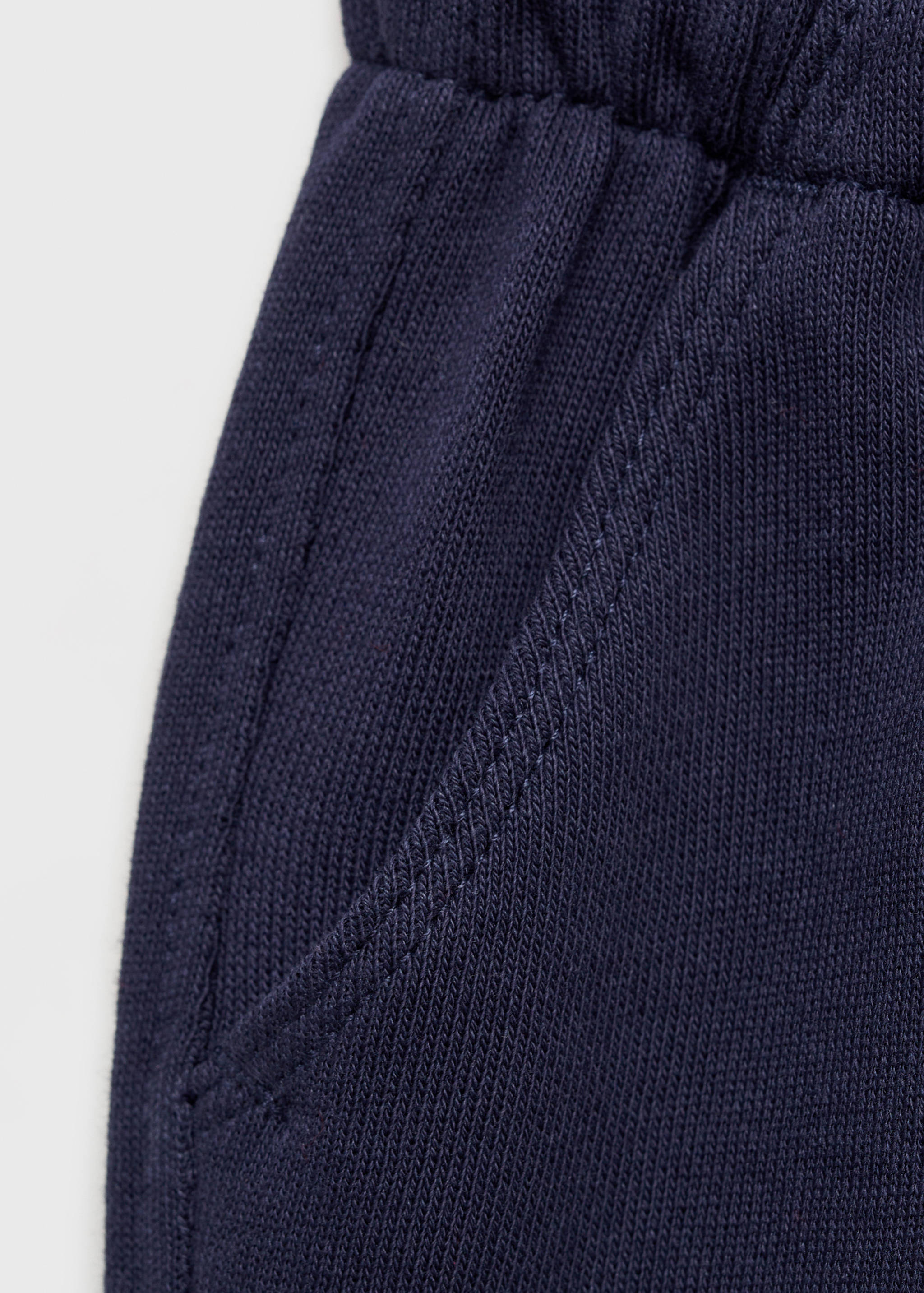 Cotton jogger-style trousers - Details of the article 0