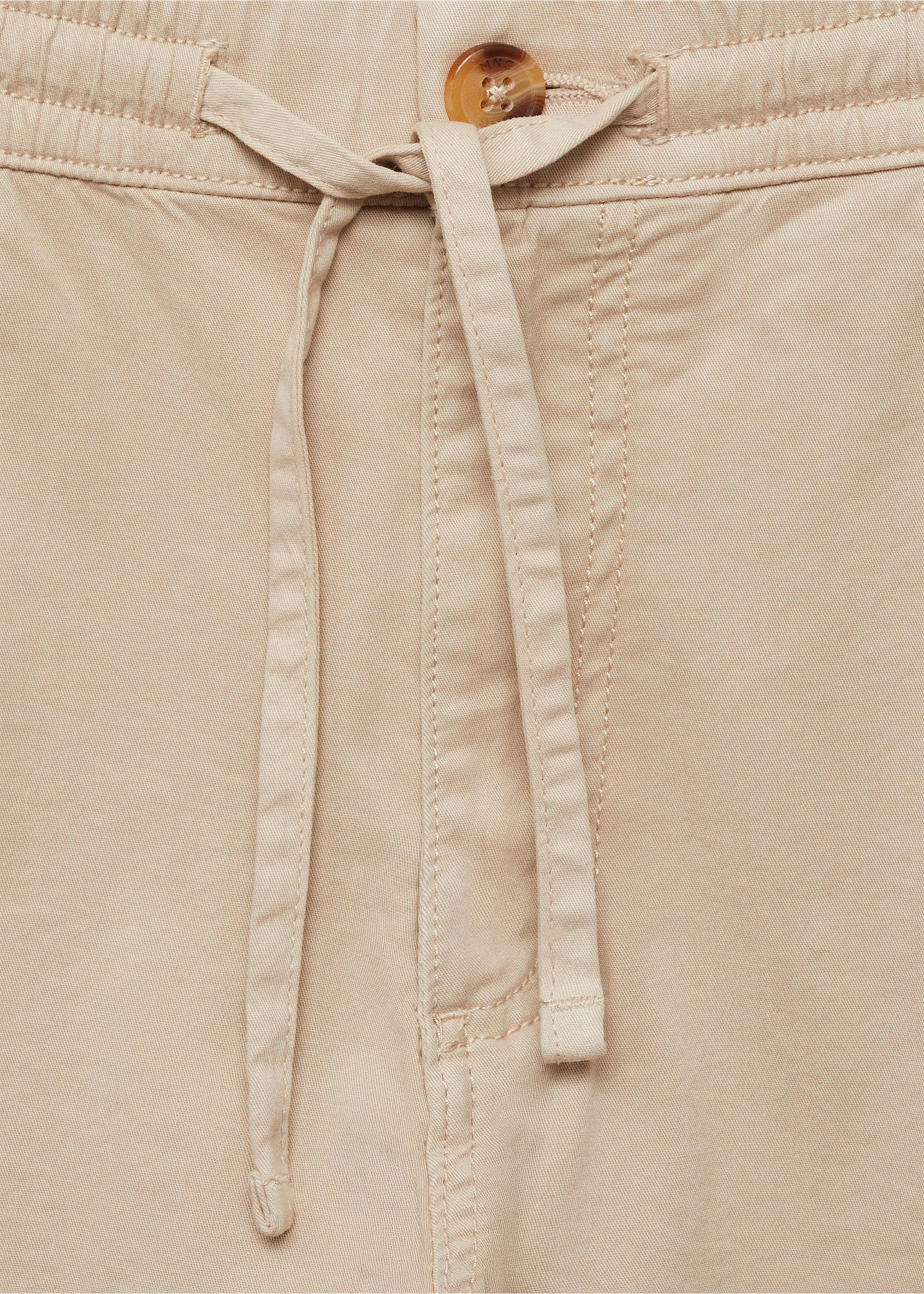 Jogger Pants aus Baumwolle mit Taschen - Detail des Artikels 8, Eisgrau. Ref: 87061055-00.
