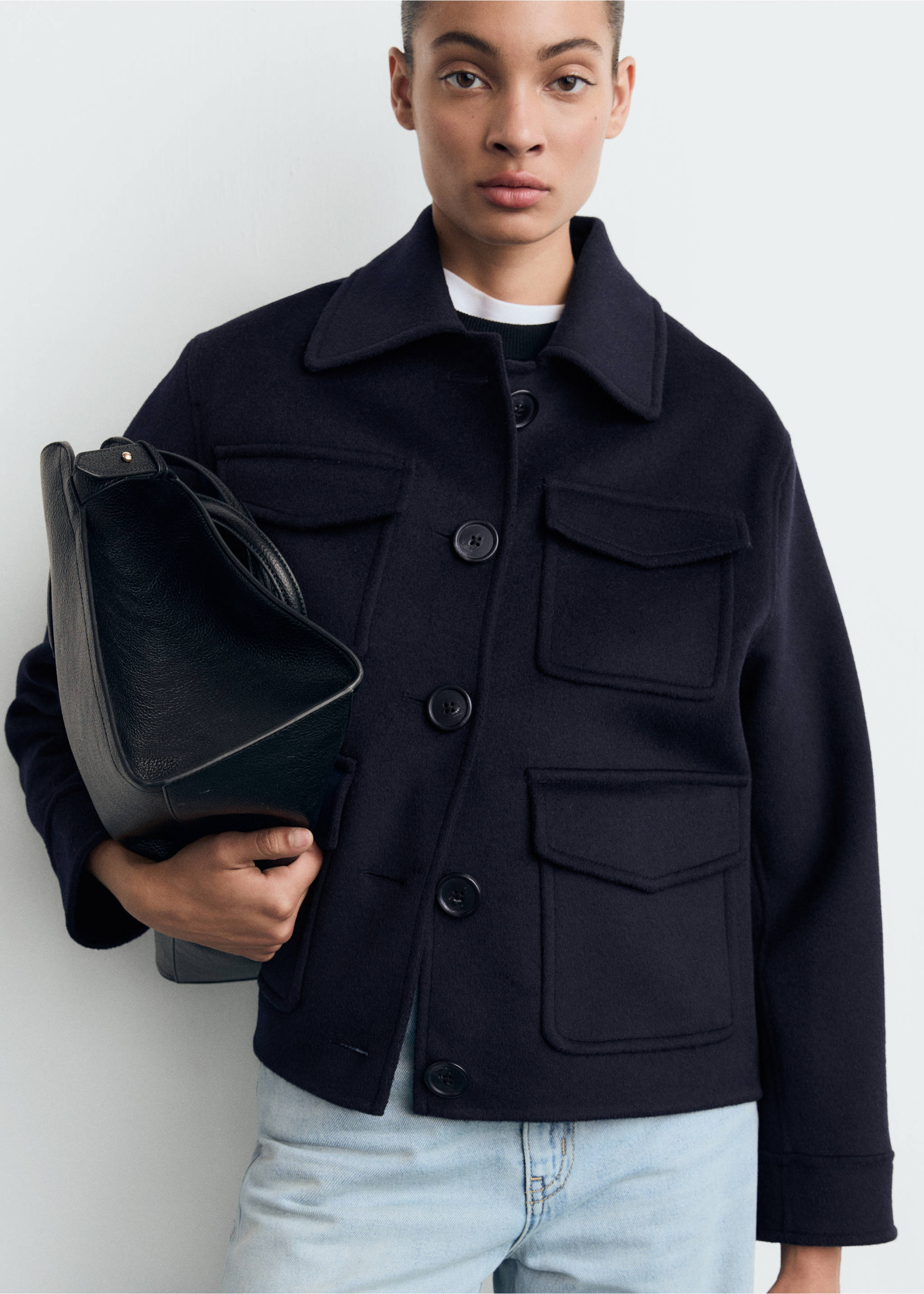 Navy blue button-up jacket with flap pockets and a classic collar., Dark Navy. Ref: 87062539-00.