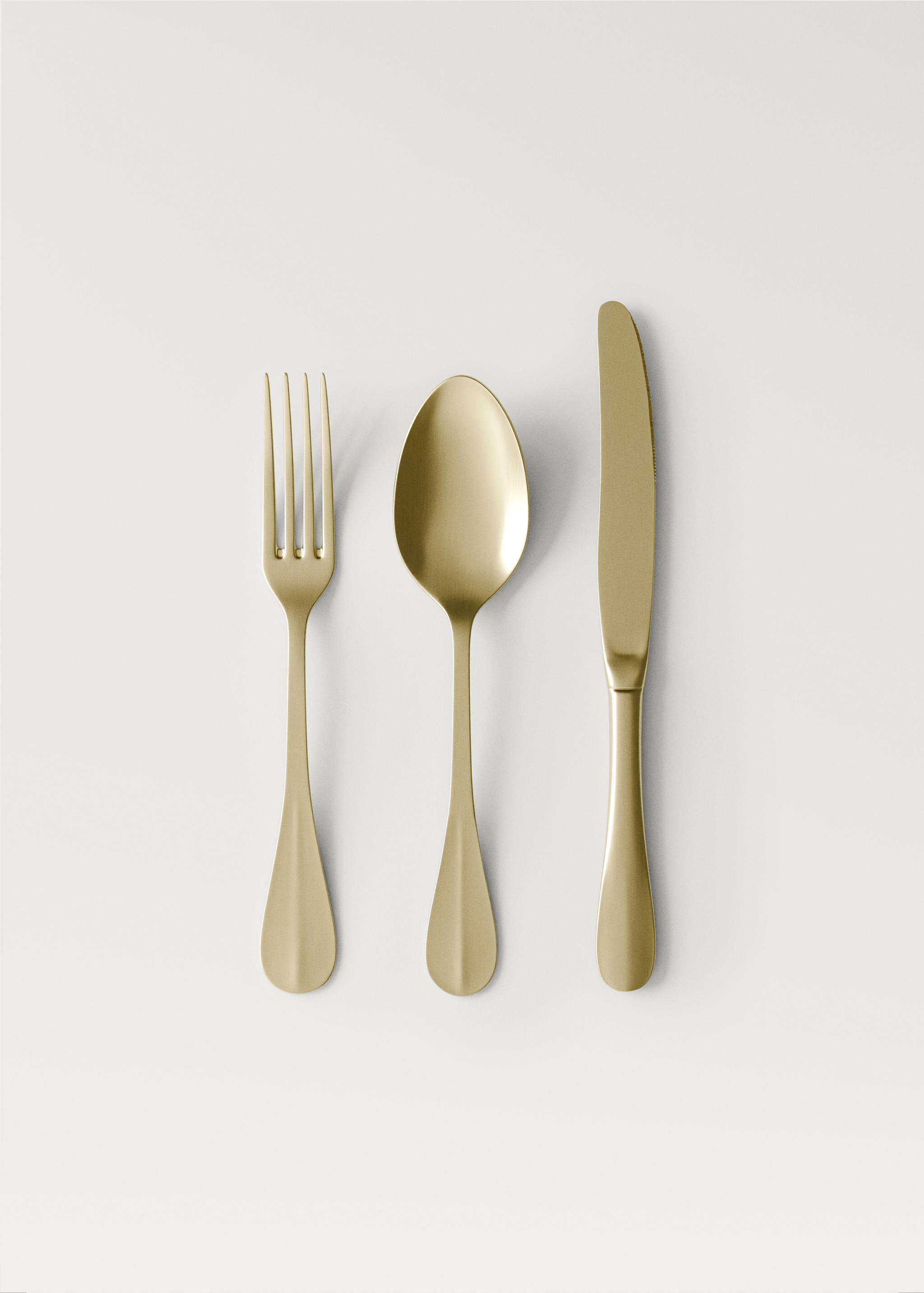 3-piece cutlery set in stainless steel with a gold finish - Article without model