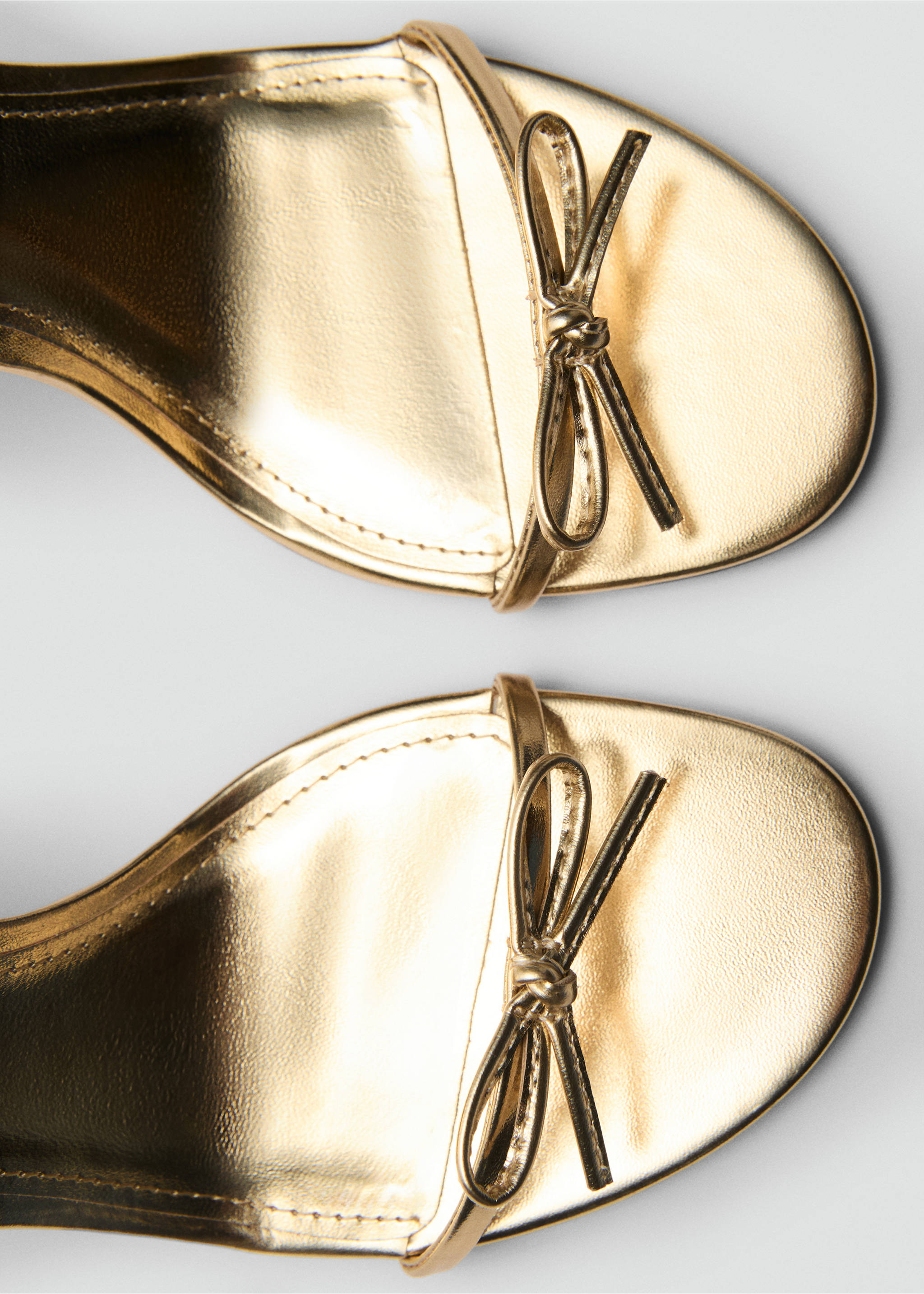 Strappy heeled sandals with bow detail - Details of the article 3, Gold. Ref: 87064077-00.