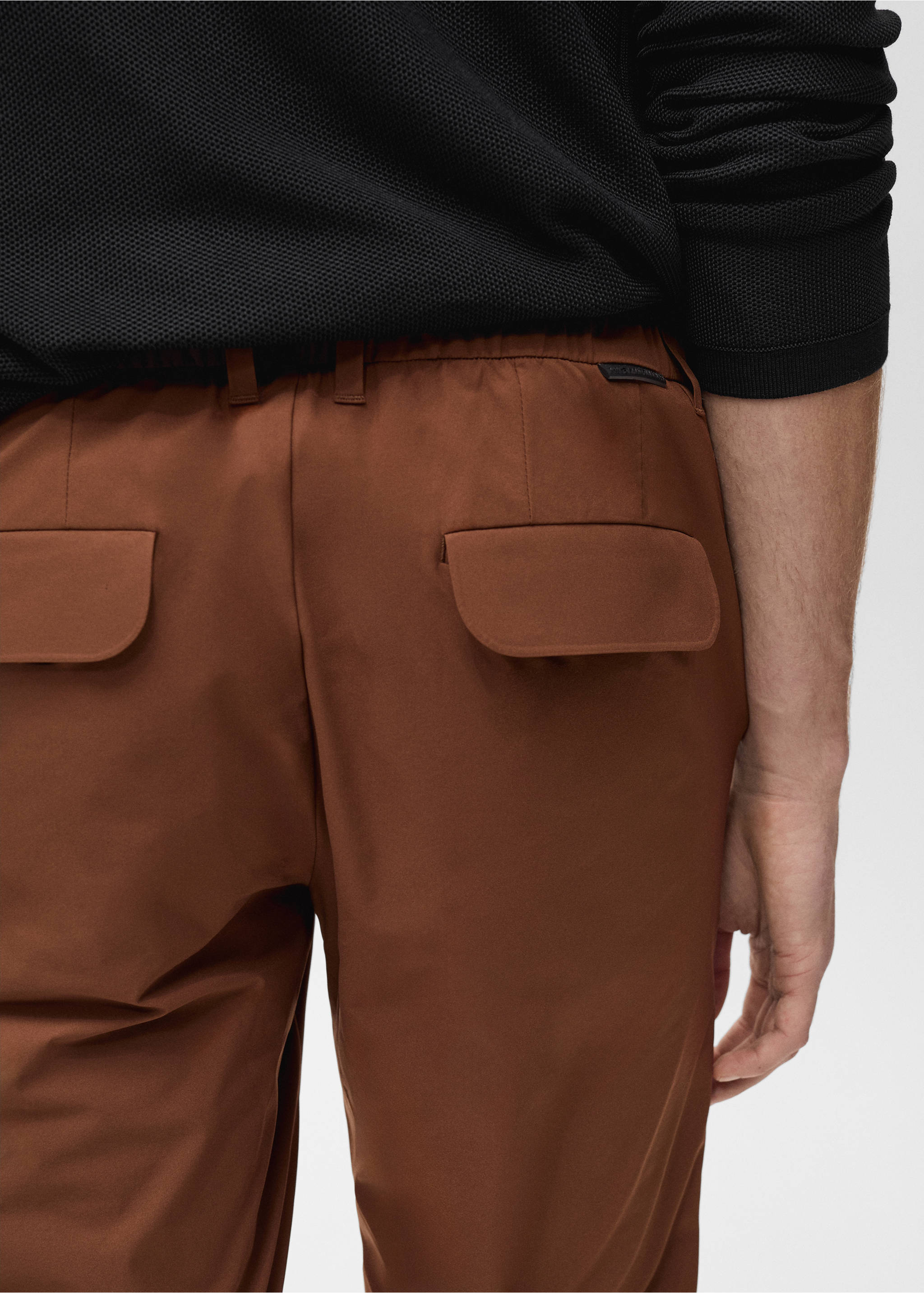 Stretch fabric slim-fit trousers with drawstring - Details of the article 6, Burnt Orange. Ref: 87064389-00.