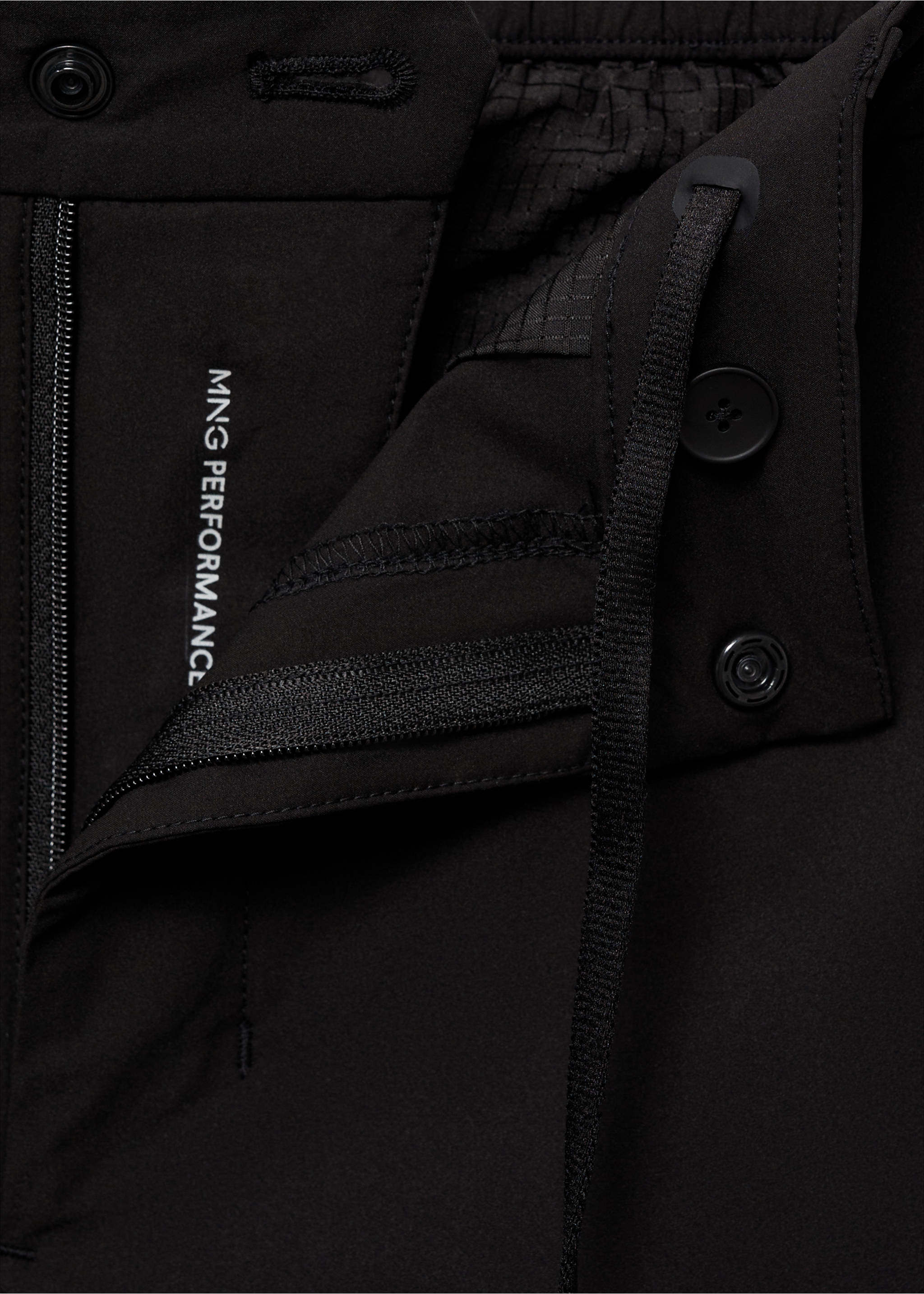 Close-up of black trousers waistband with a drawstring and MNG Performance print., Black. Ref: 87064389-00.