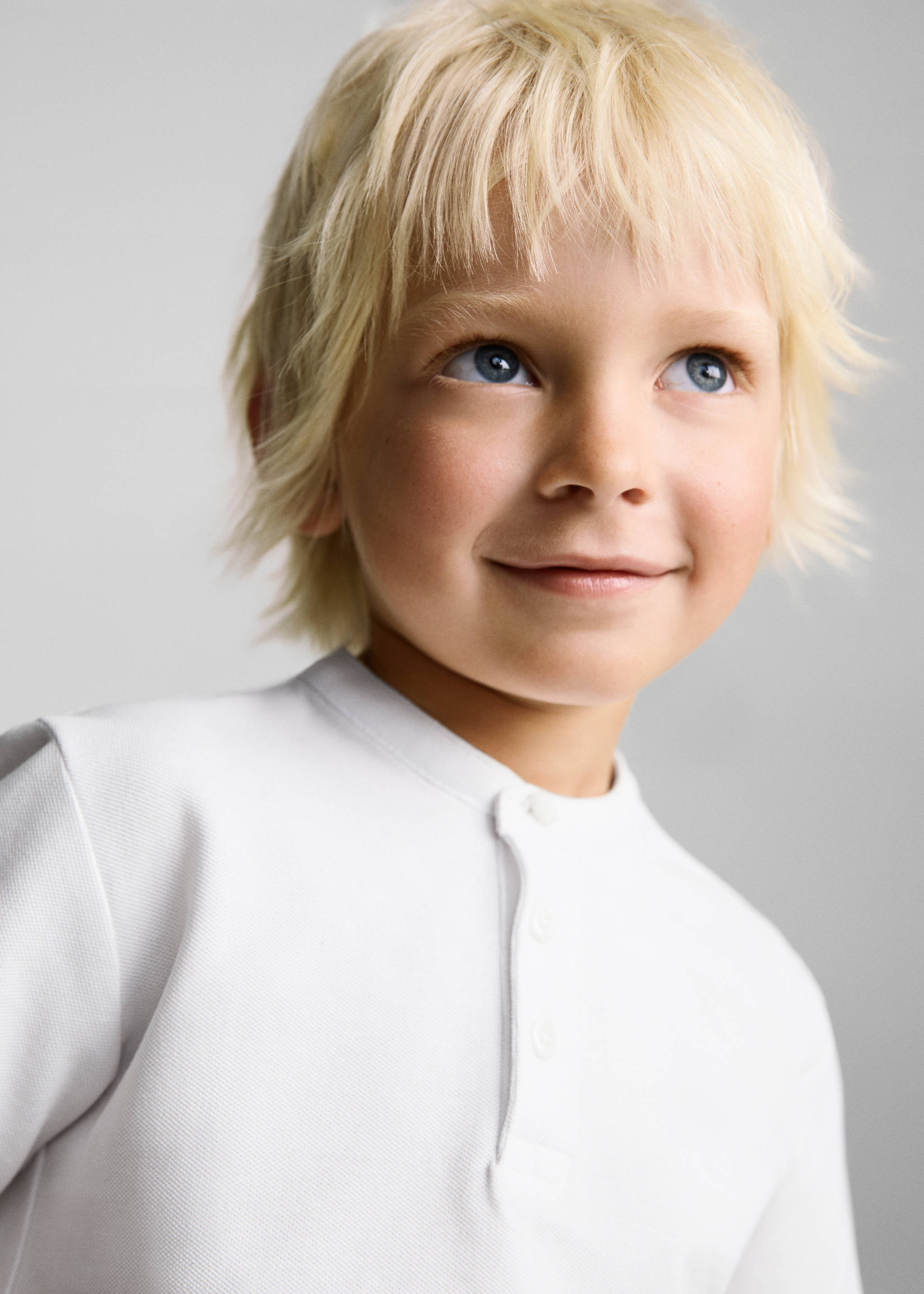 Baumwoll-Poloshirt mit Stehkragen - Detail des Artikels 1