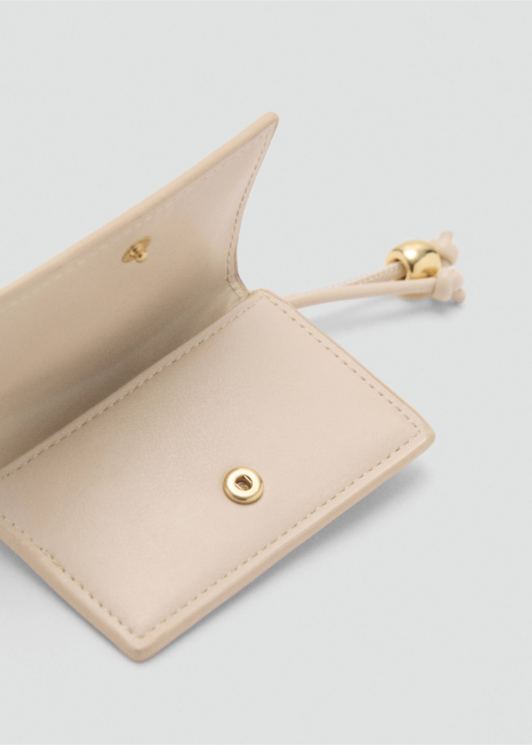 Faux-leather purse with bead detail - Details of the article 1, Off White. Ref: 87064809-00.
