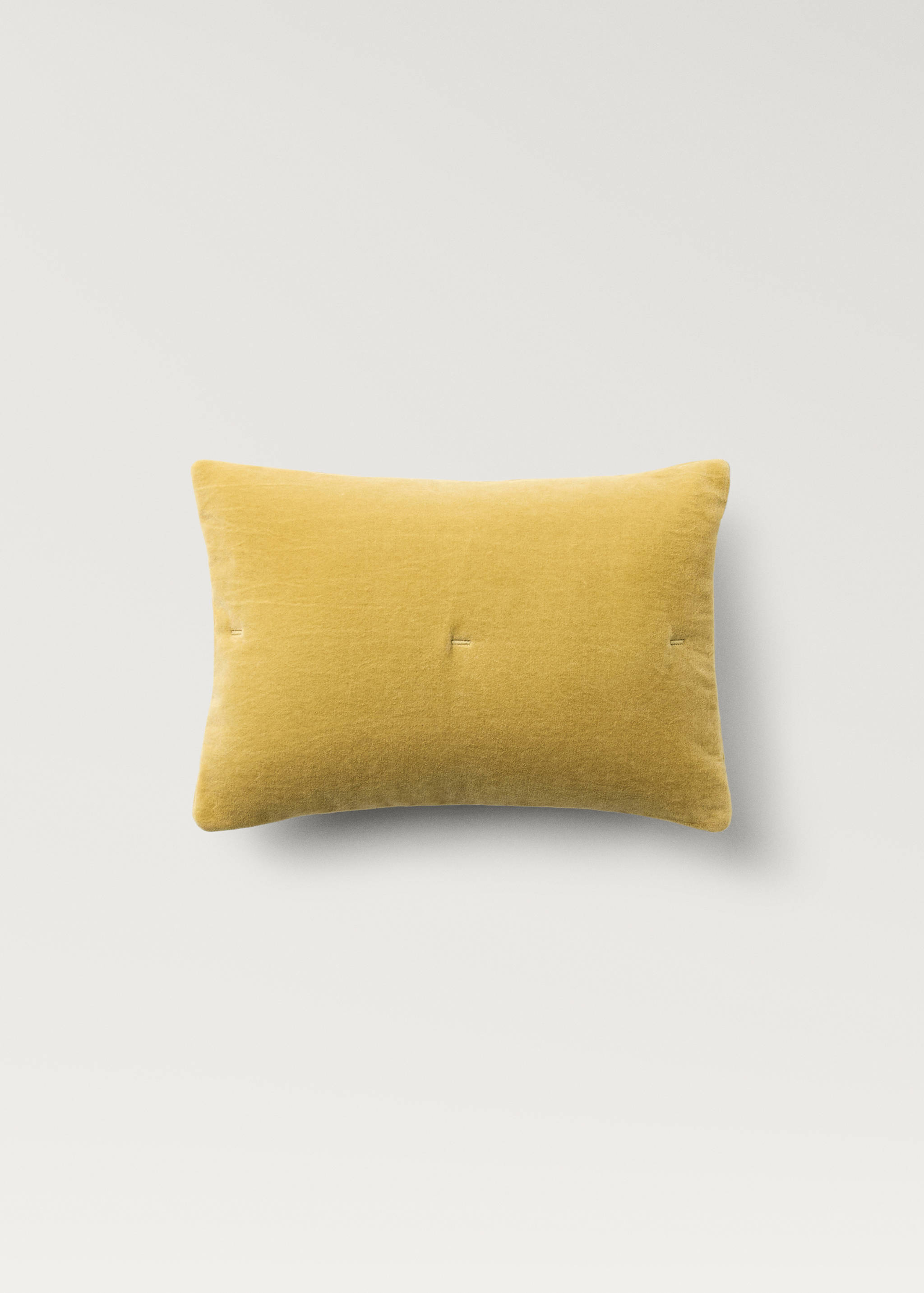 Yellow rectangular bed cushion cover with a textured finish.