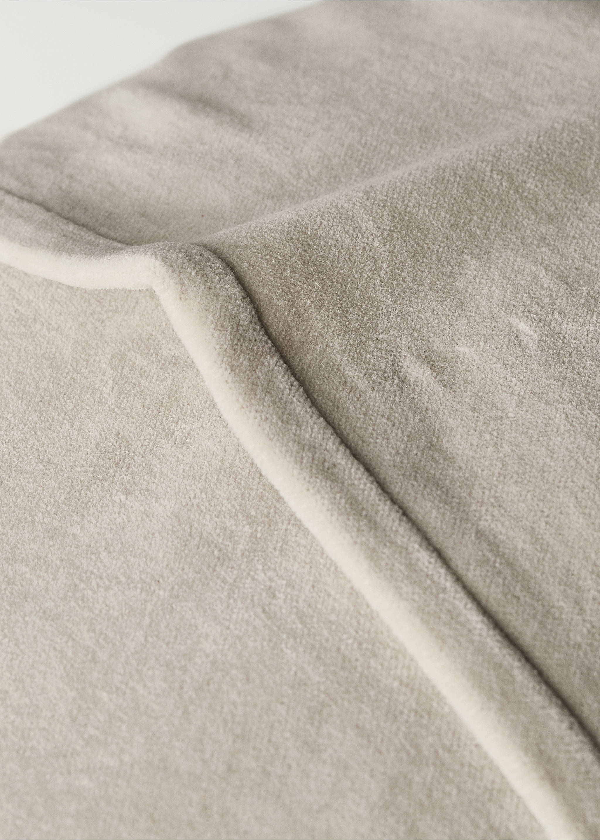 Close-up of a soft beige velvet cushion cover texture., Light/Pastel Grey. Ref: 87065144-00.
