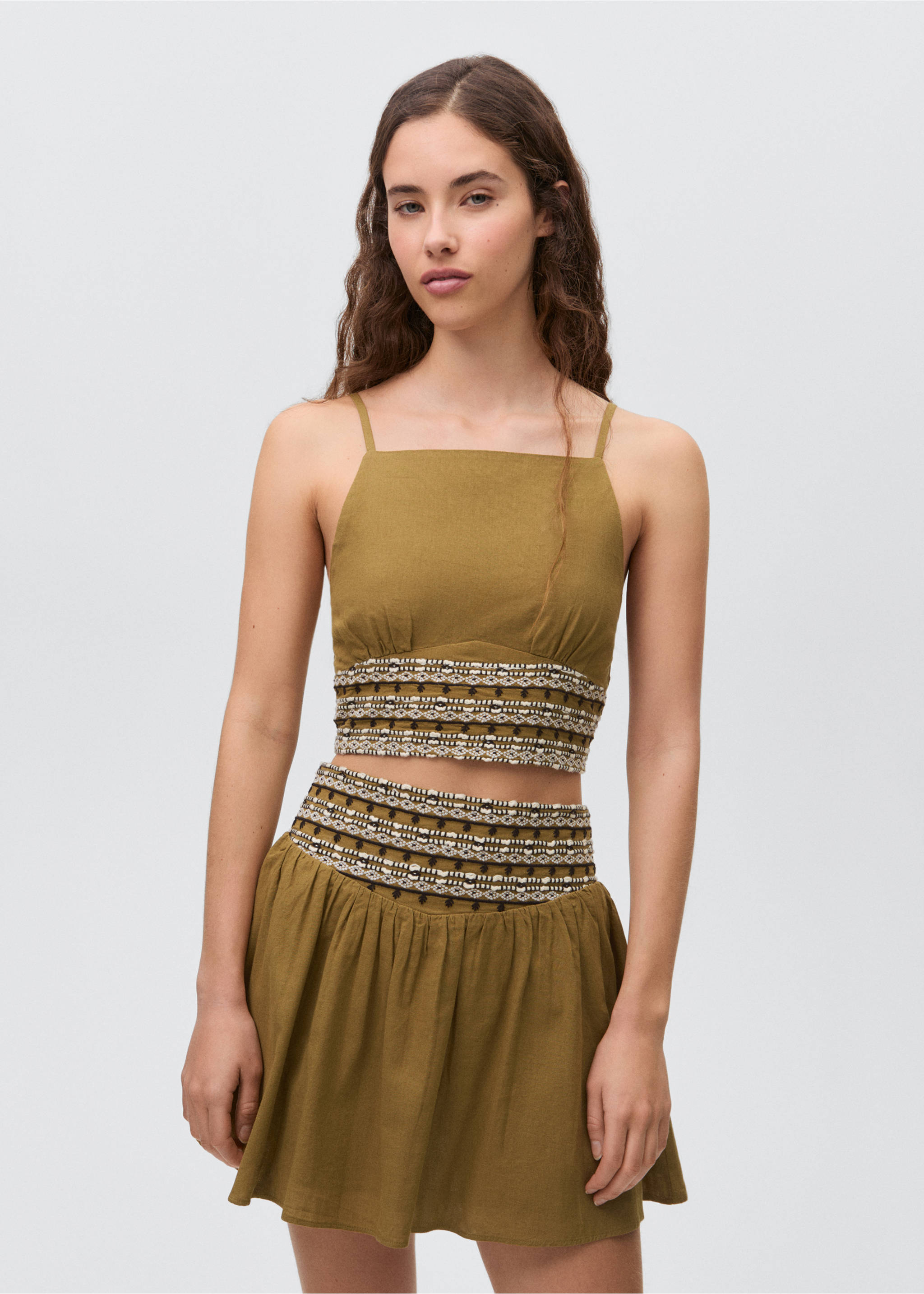Short skirt with embroidered waist - Details of the article 2, Olive Green. Ref: 87065726-00.