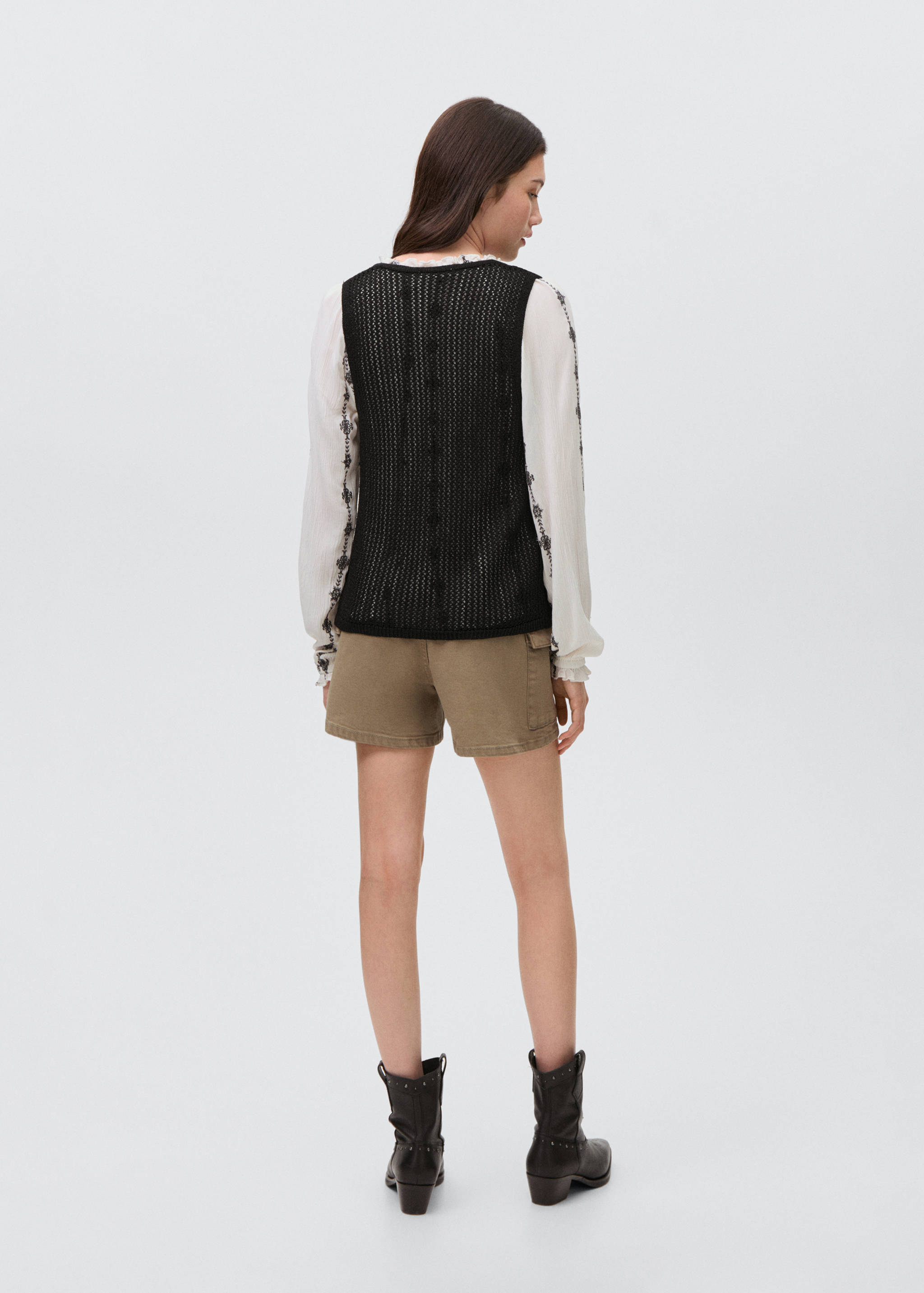 Knitted vest with lace pattern - Reverse of the article