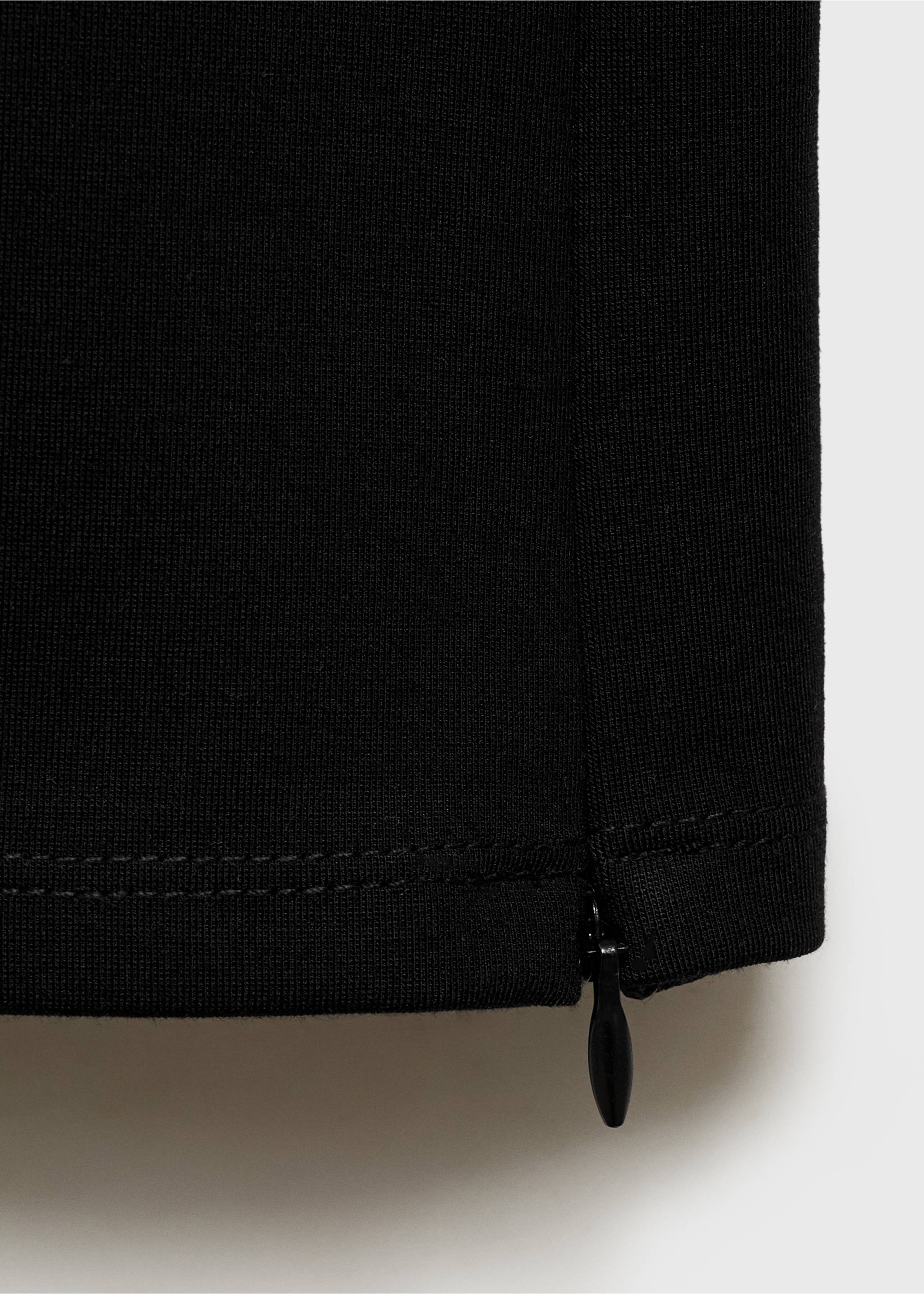Skinny trousers with openings - Details of the article 8, Black. Ref: 87065741-00.