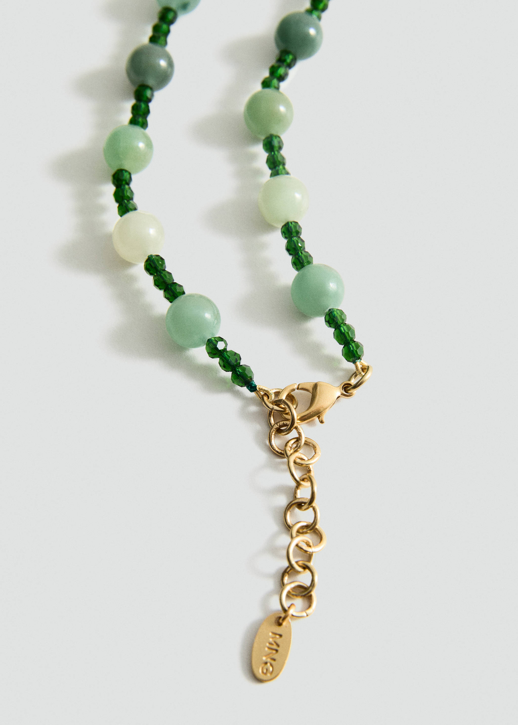 Ball necklace with stone flower detail - Medium plane