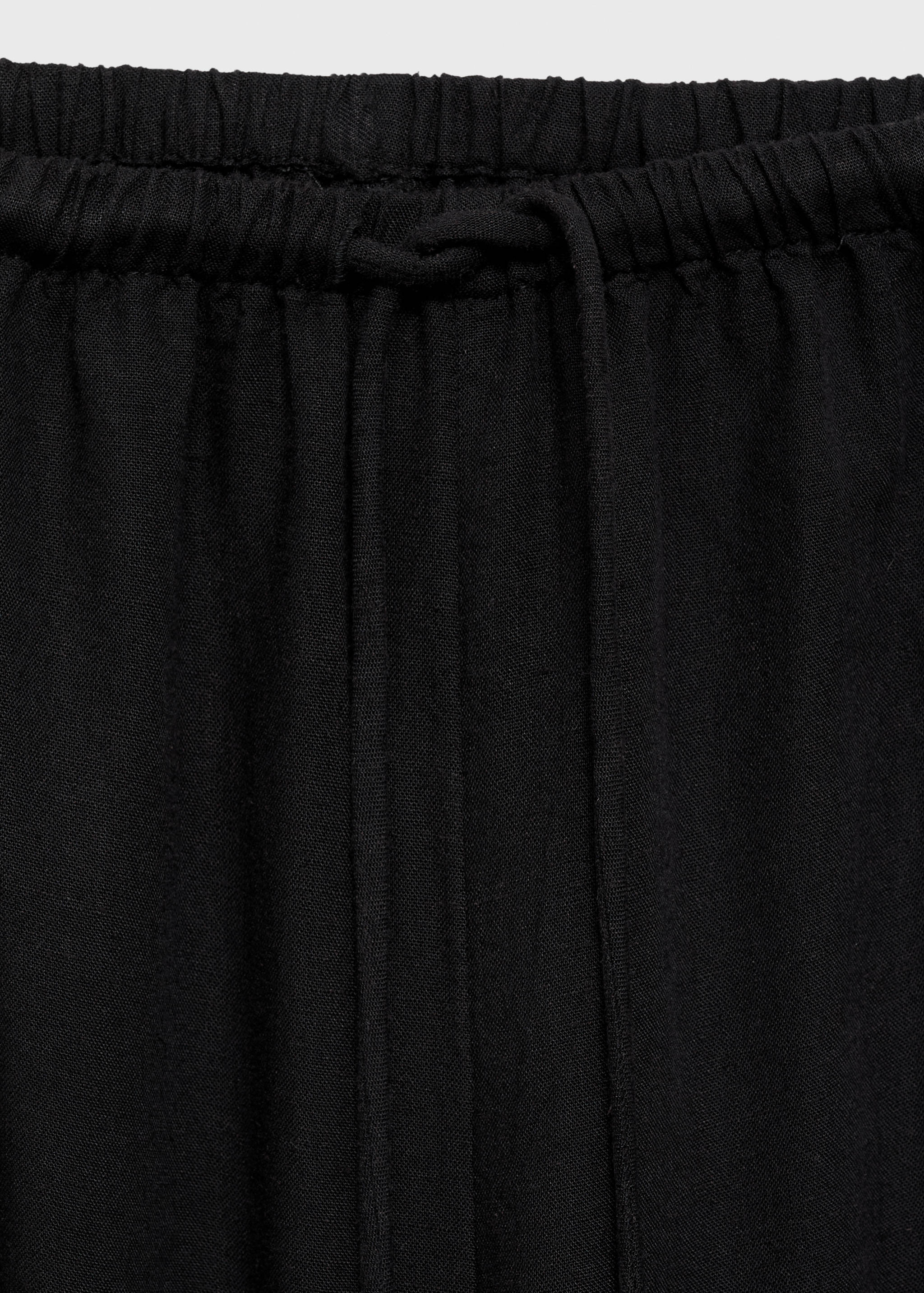 Pantalons rectes lli - Detall de l'article 8