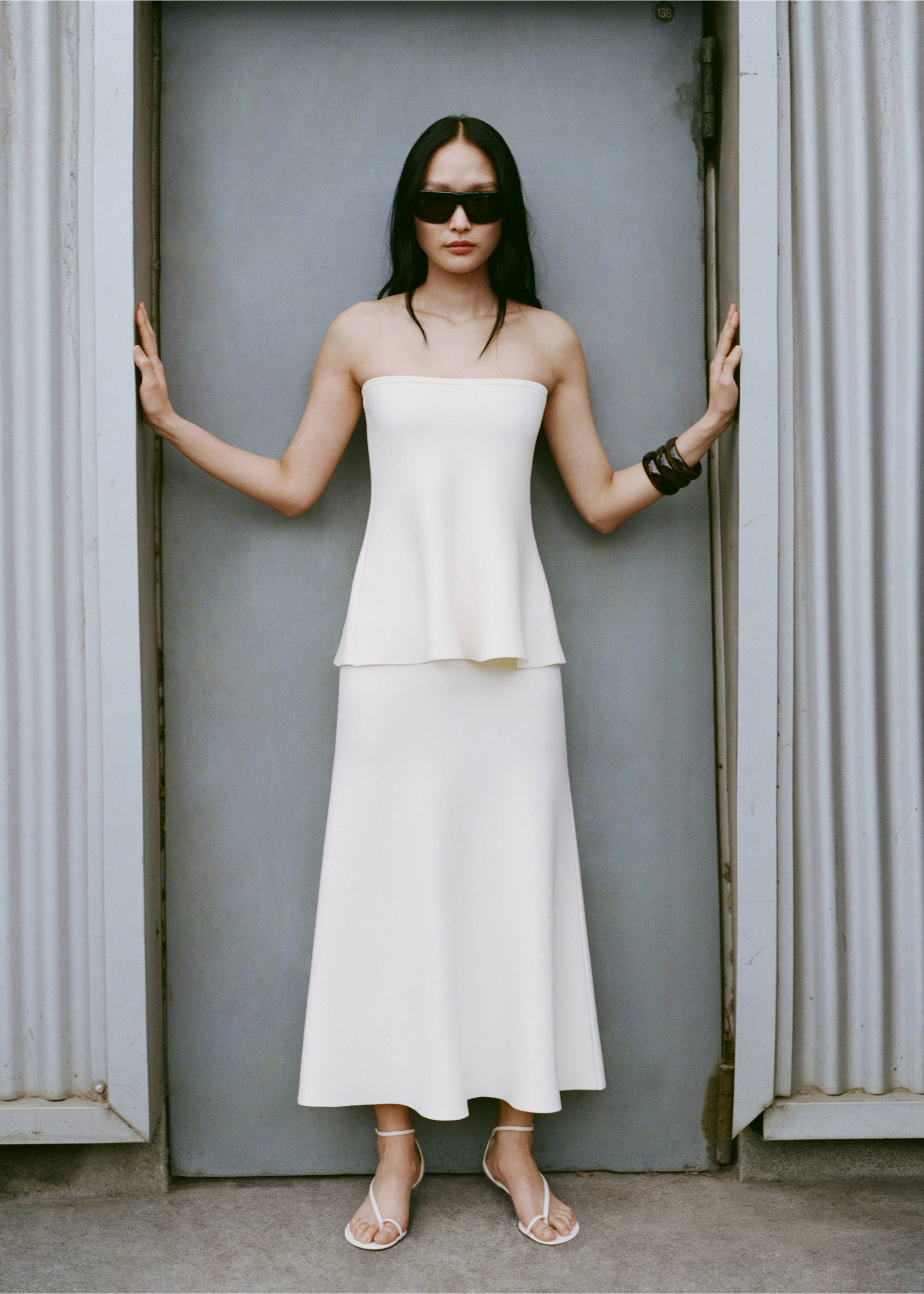 Fine-knit peplum skirt - Details of the article 6, Ecru. Ref: 87066367-00.