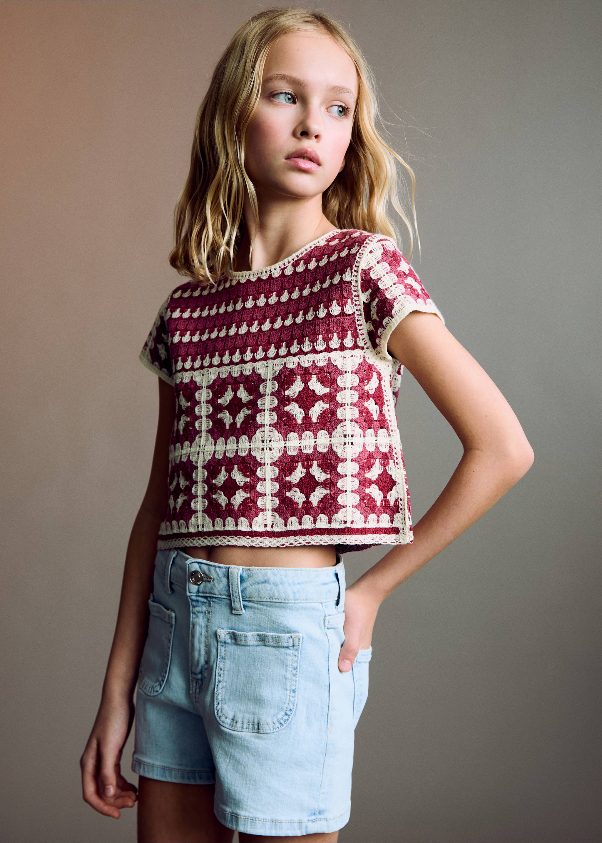Light blue denim shorts with front patch pockets worn with a patterned knit top., Light Blue. Ref: 87066711-00.