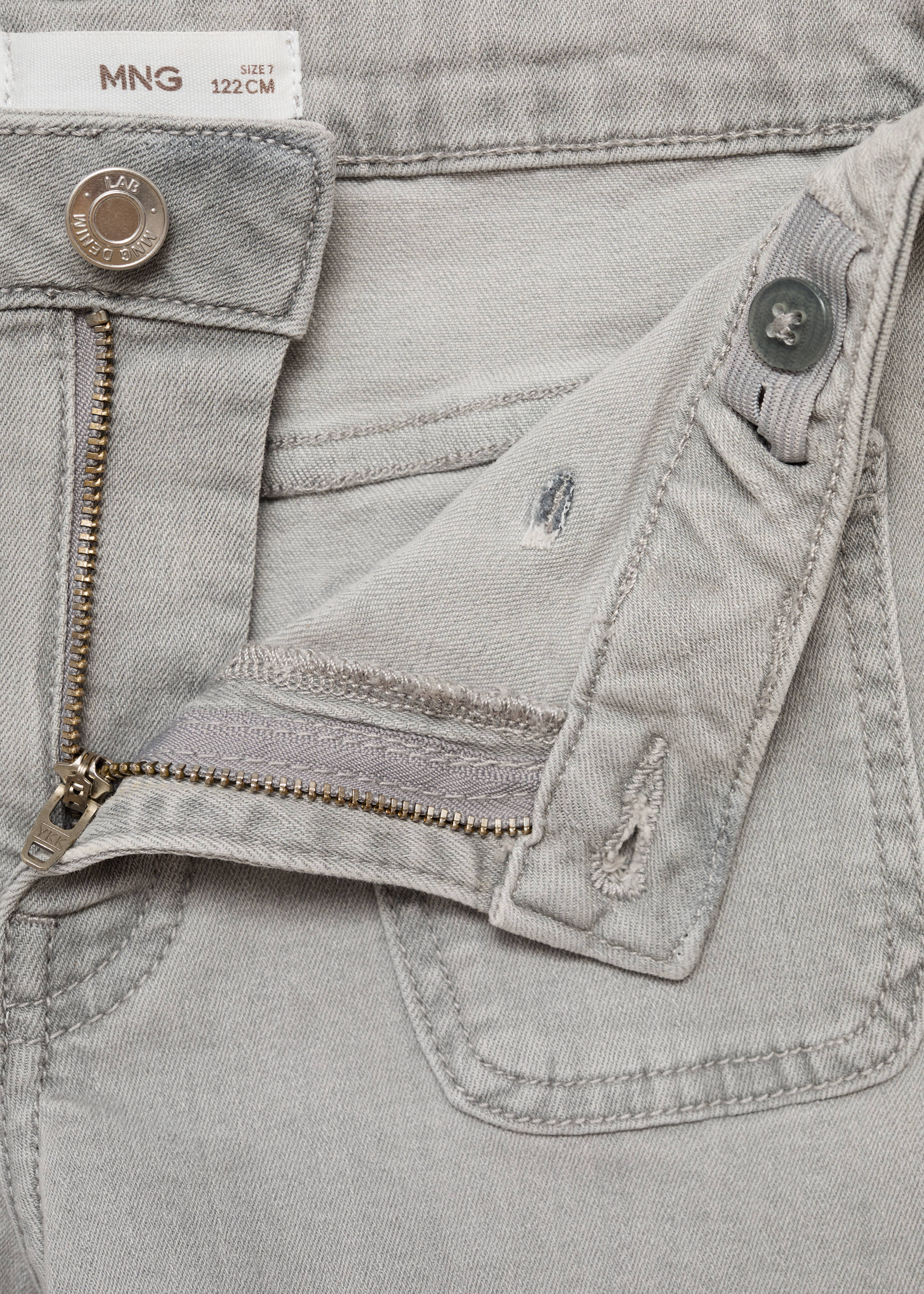 Close-up of grey denim shorts with an adjustable elasticated waistband.