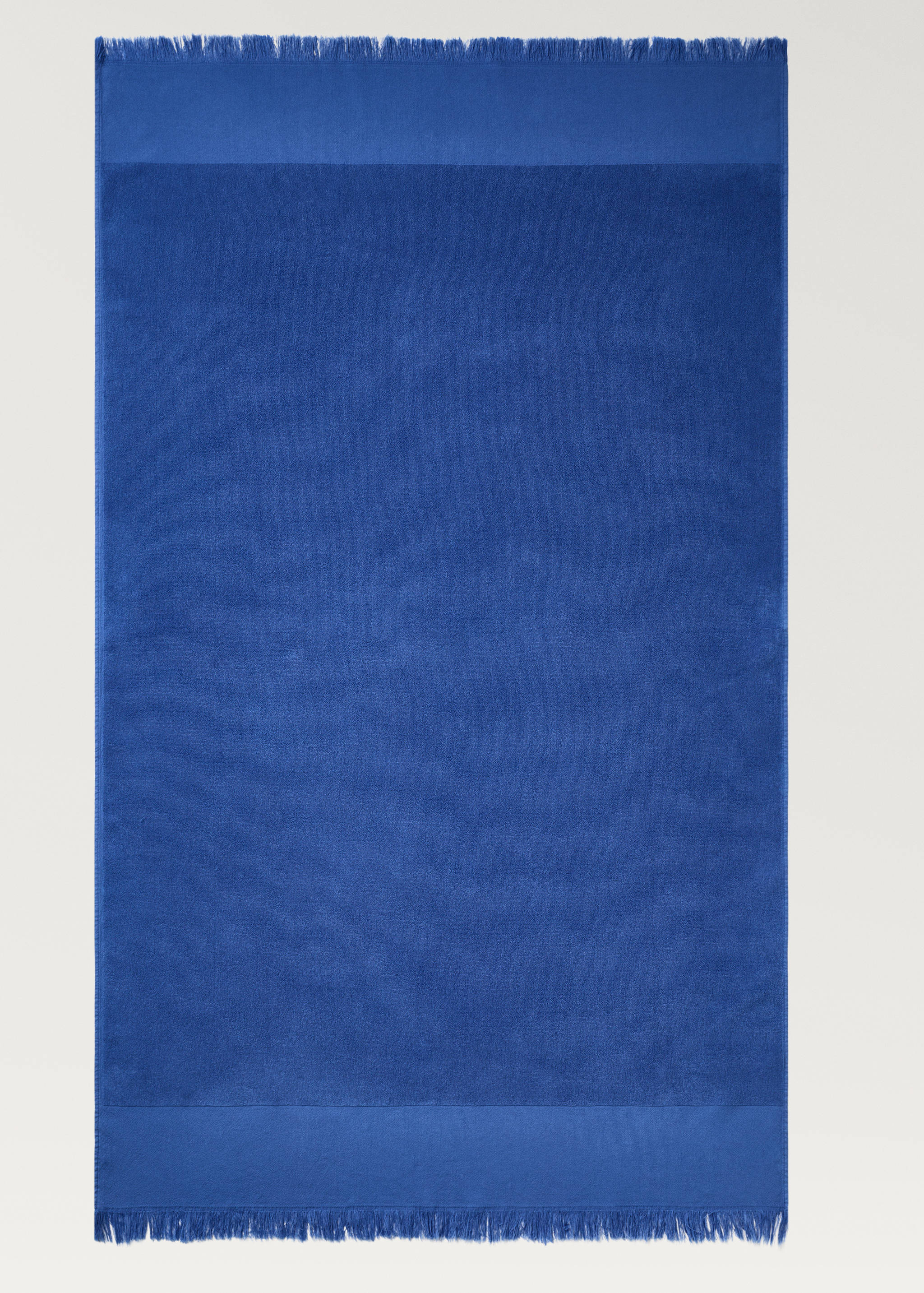 Overdyed terry beach towel with fringes - Home | MANGO OUTLET