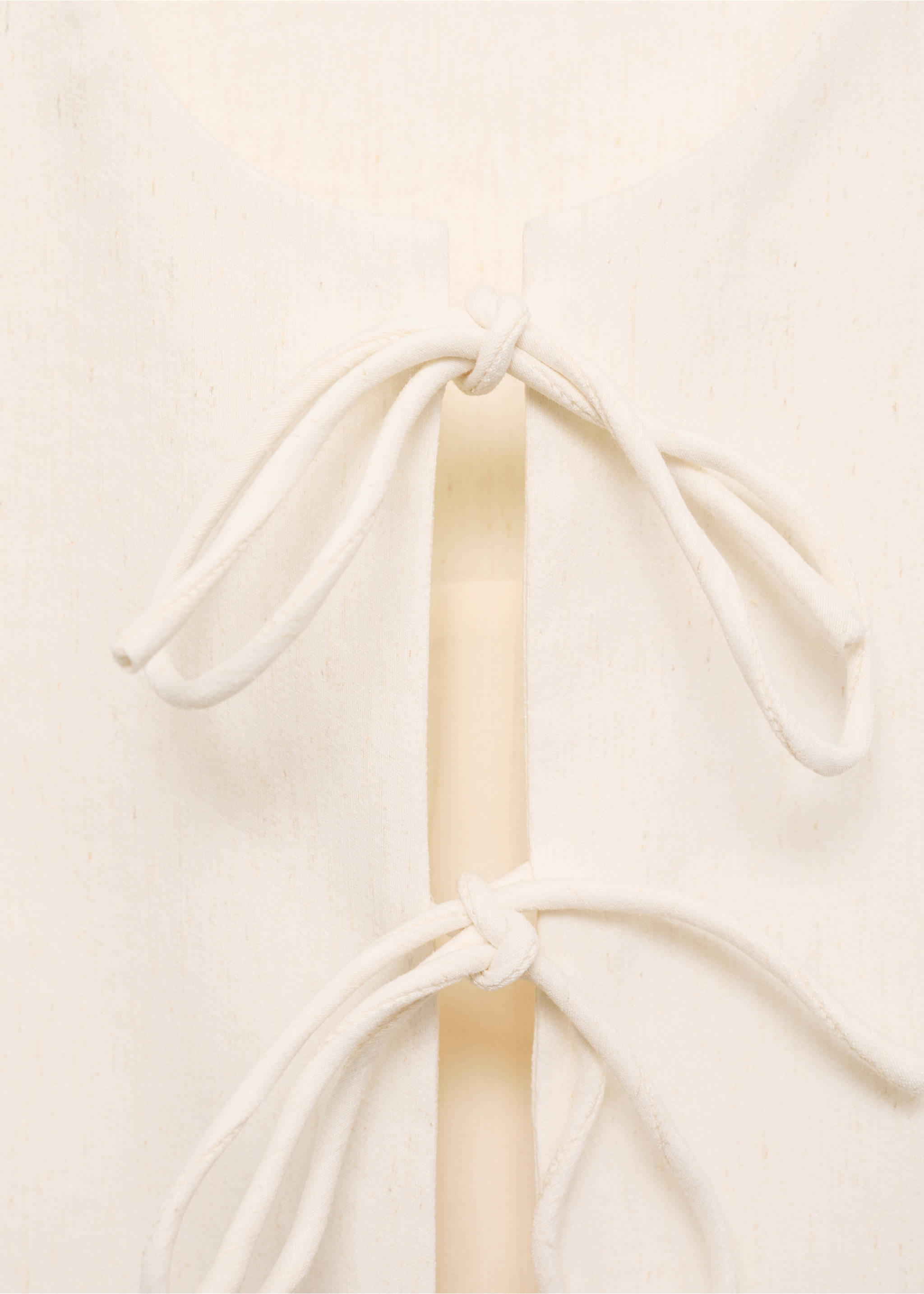 Linen-blend top with bow - Details of the article 8, Ecru. Ref: 87067185-00.
