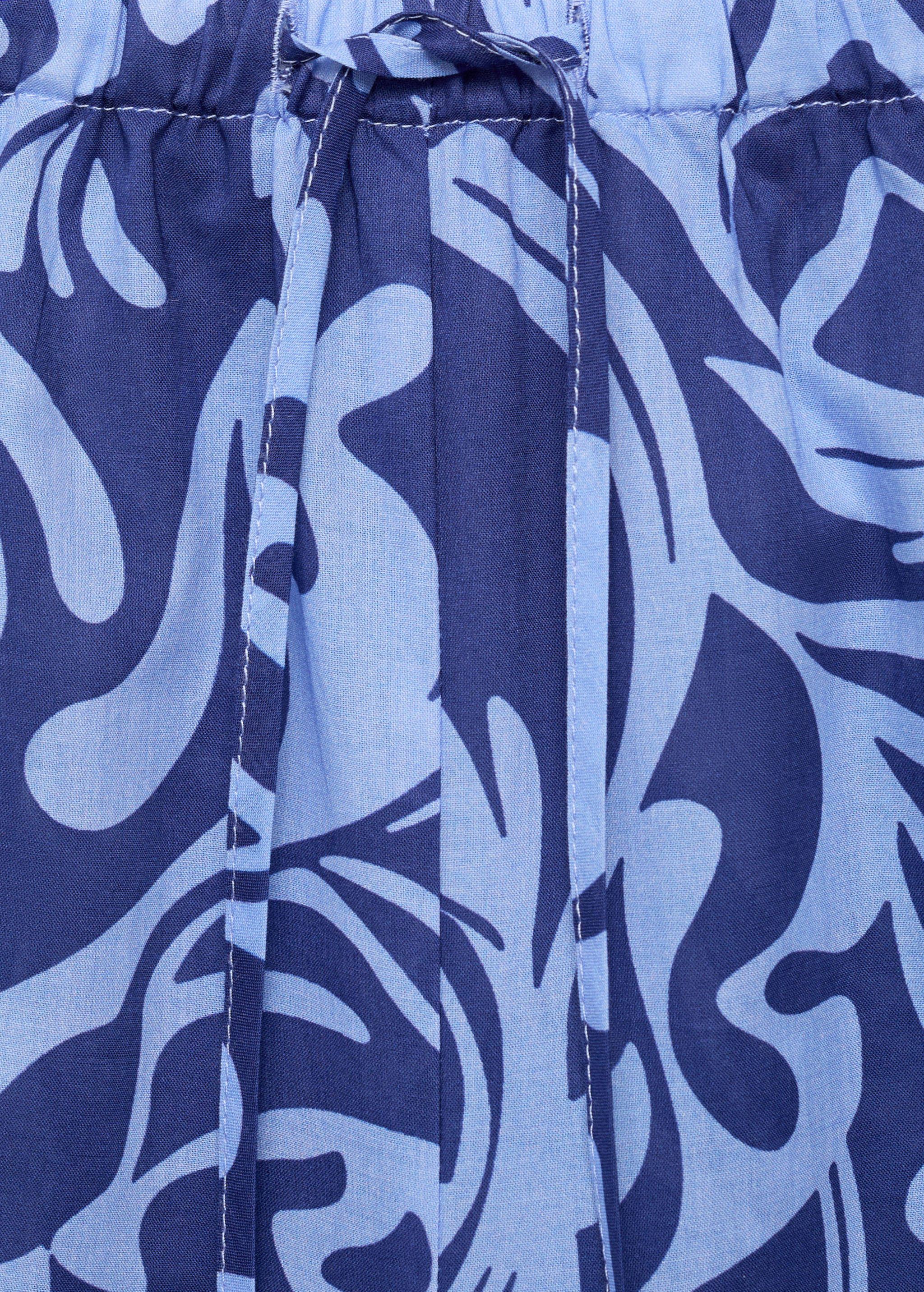 Cotton two-tone printed trousers - Details of the article 0