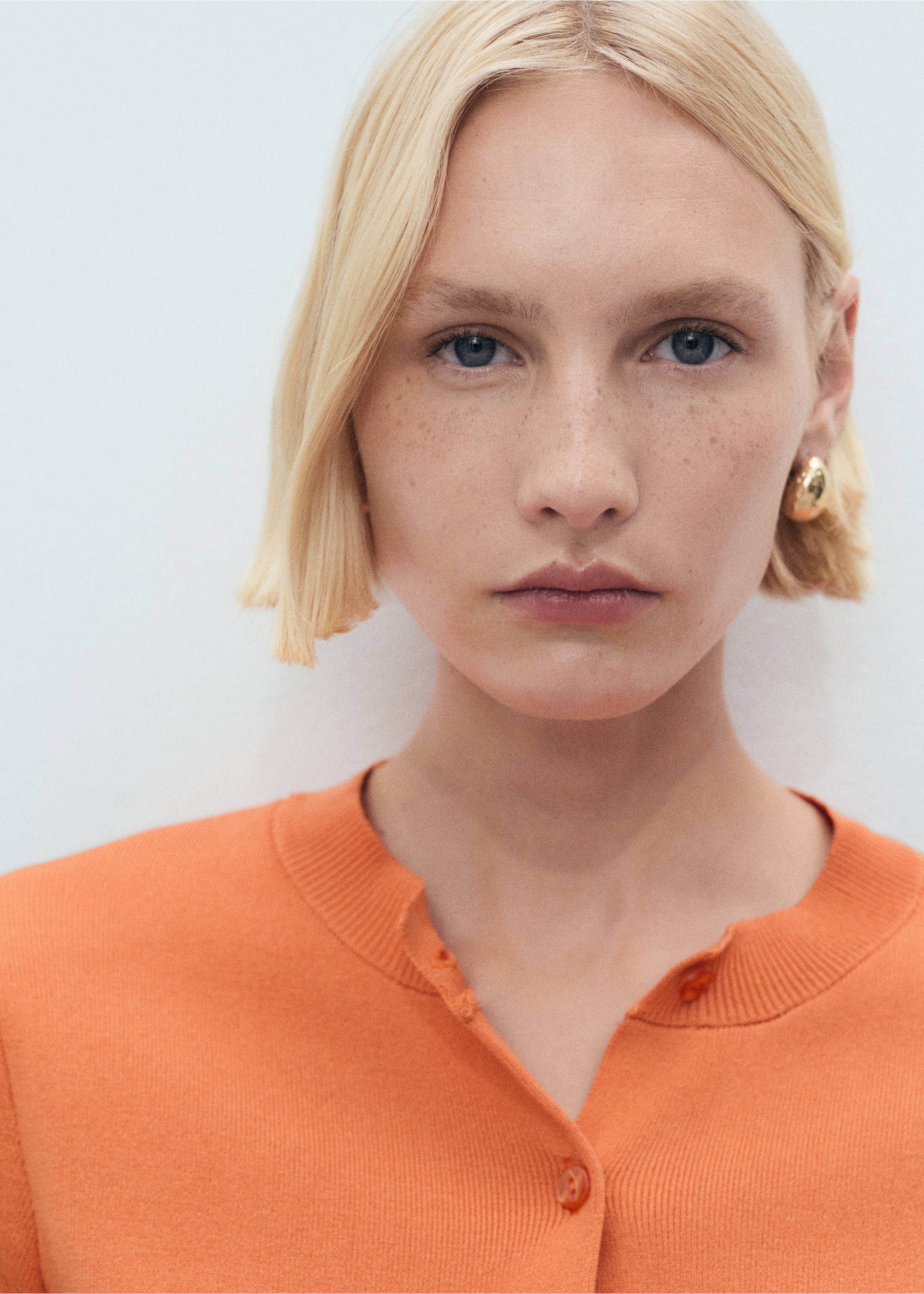 Strickcardigan mit Taschen - Detail des Artikels 1, Orange. Ref: 87068648-00.