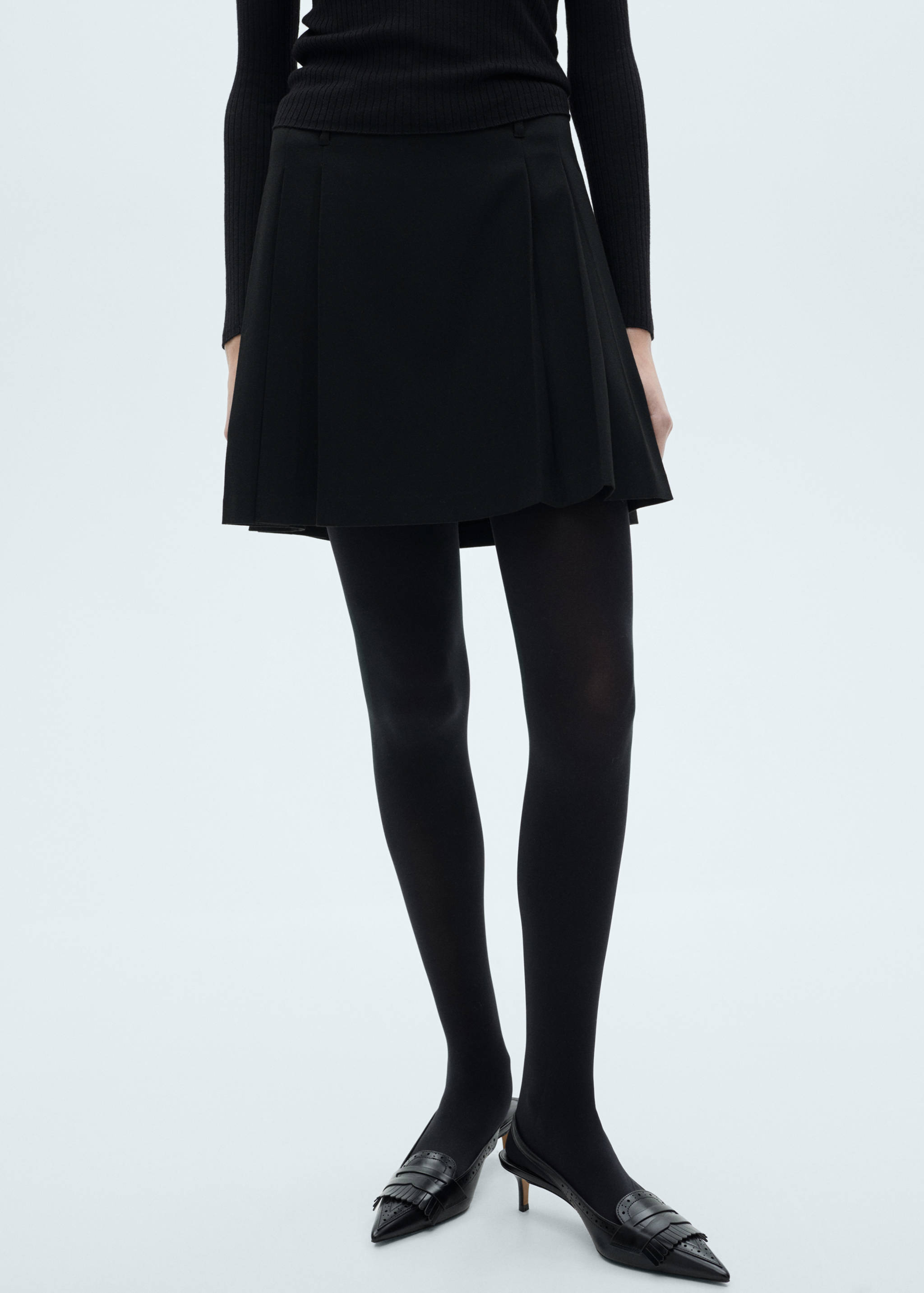 Veckad minikjol - Bild av mittparti