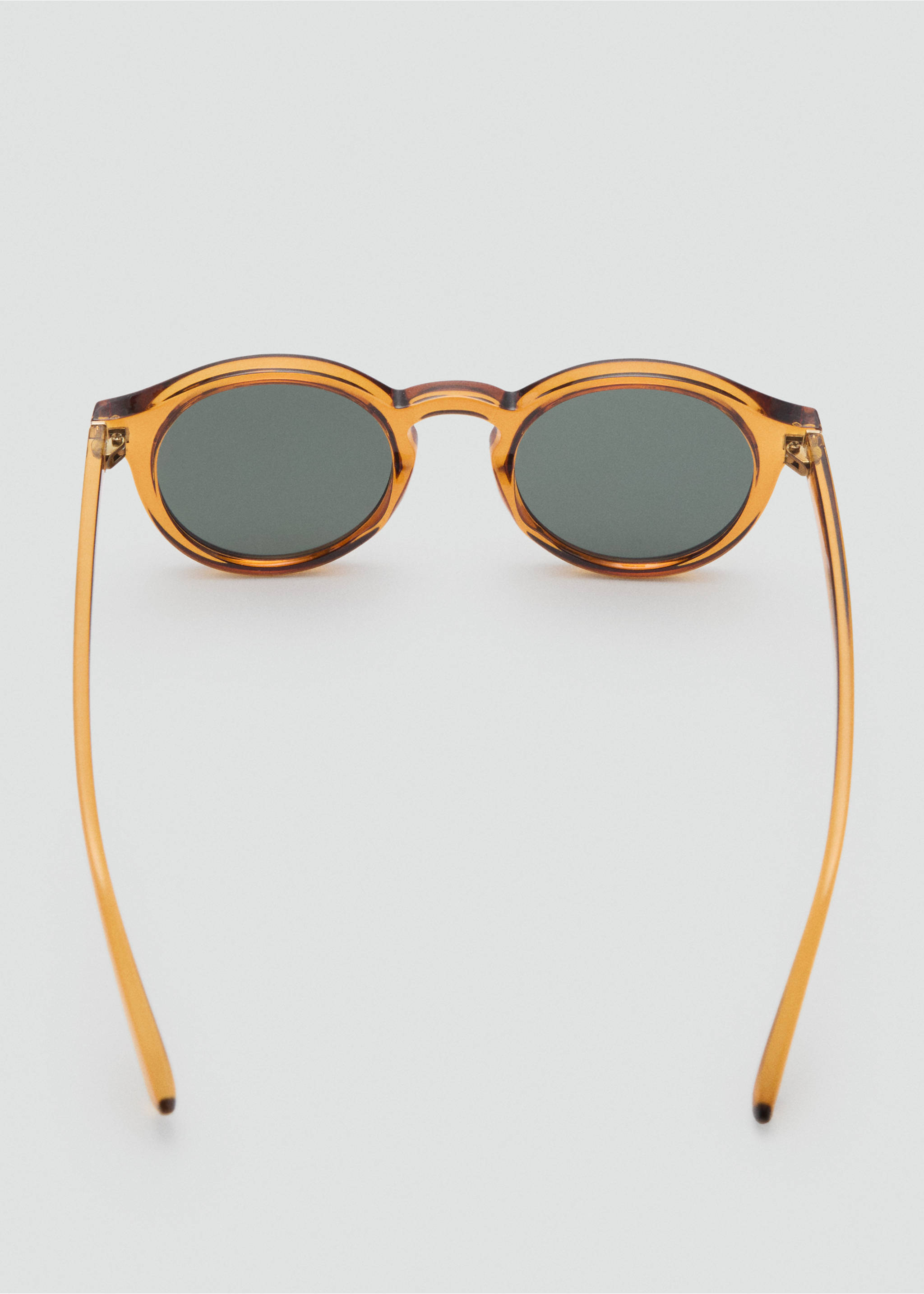 Sonnenbrille mit rundem Gestell - Detail des Artikels 1, Okker. Ref: 87070605-00.