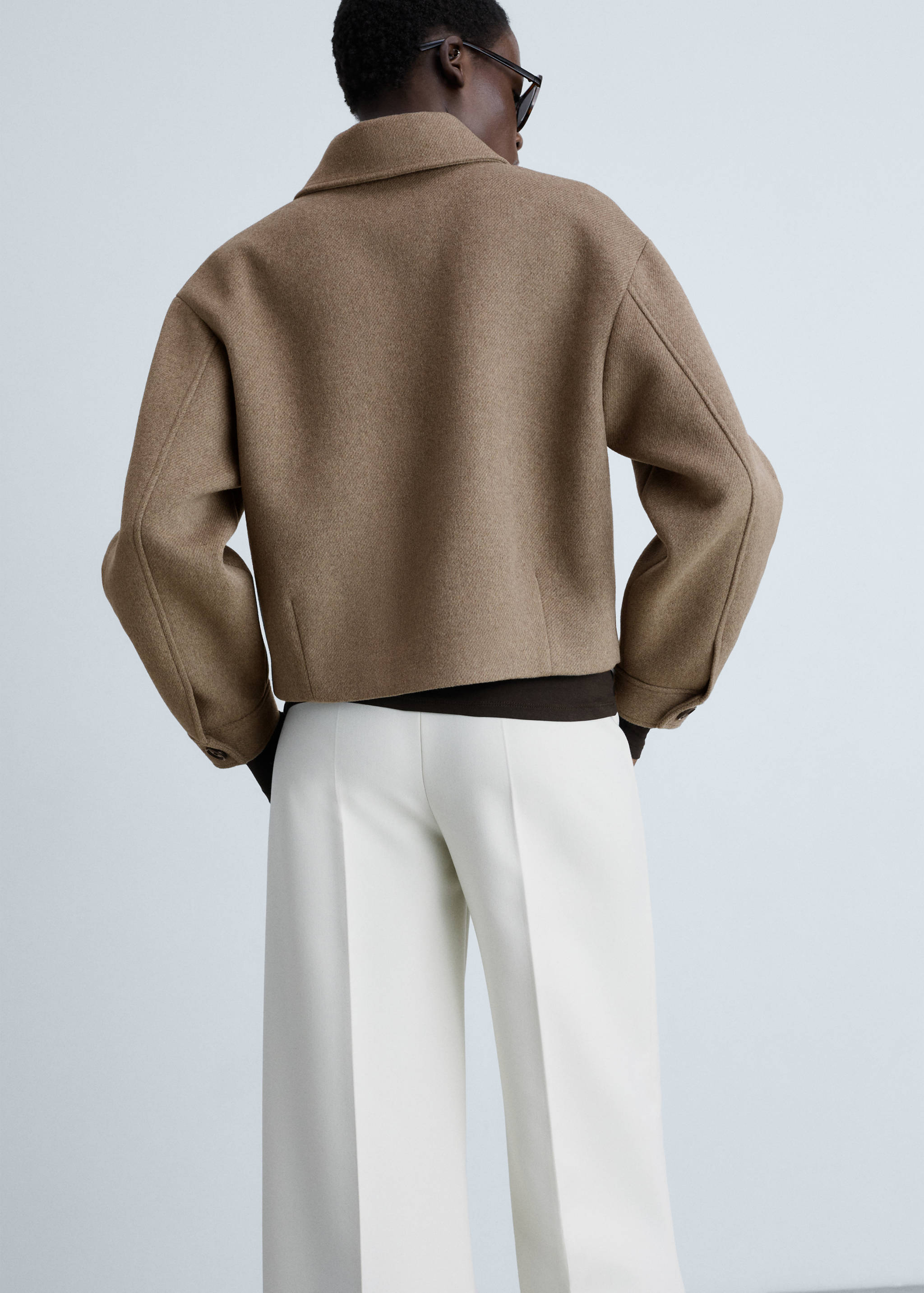 Wool jacket with pockets - Reverse of the article