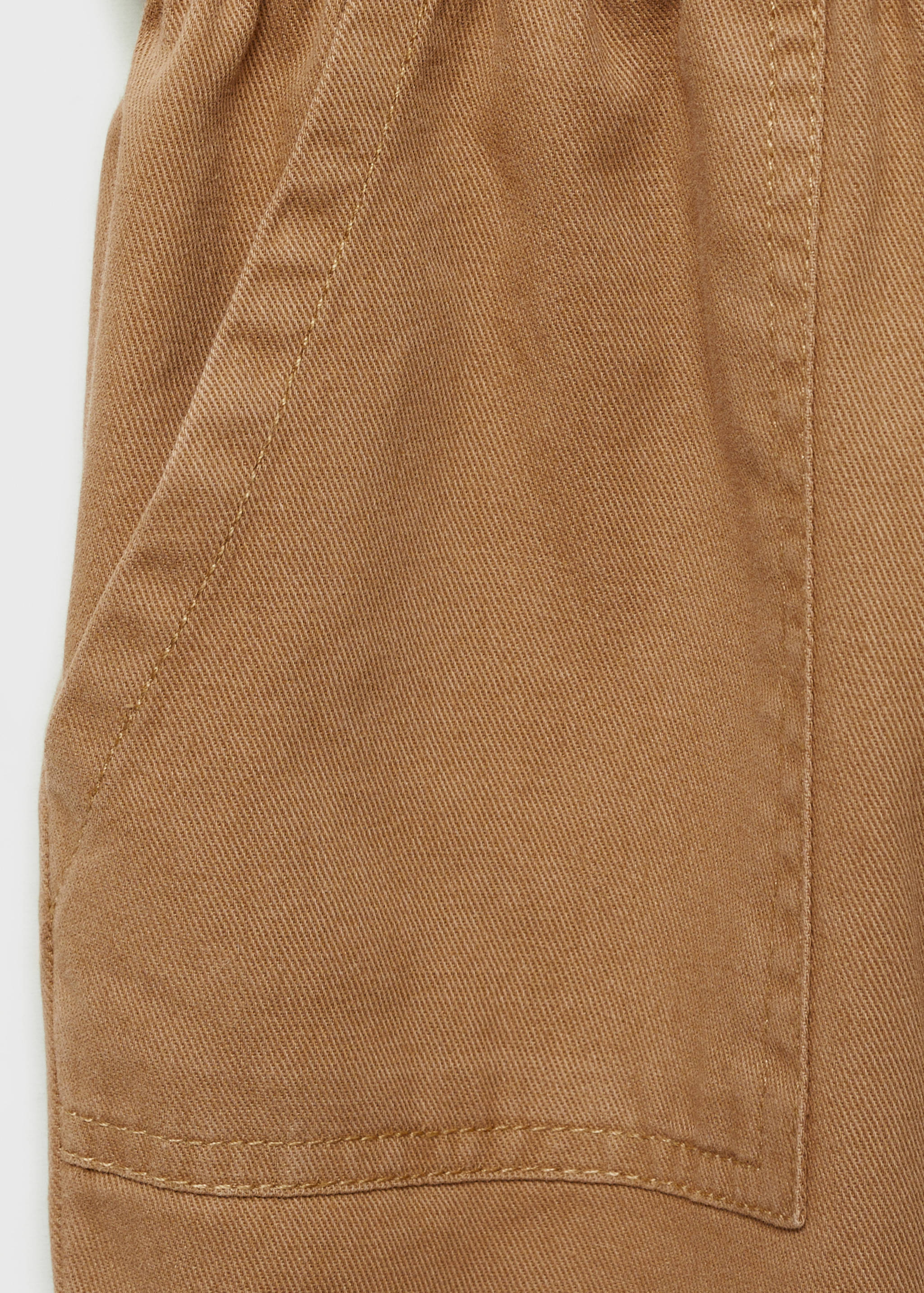 Buttoned long jumpsuit - Details of the article 0