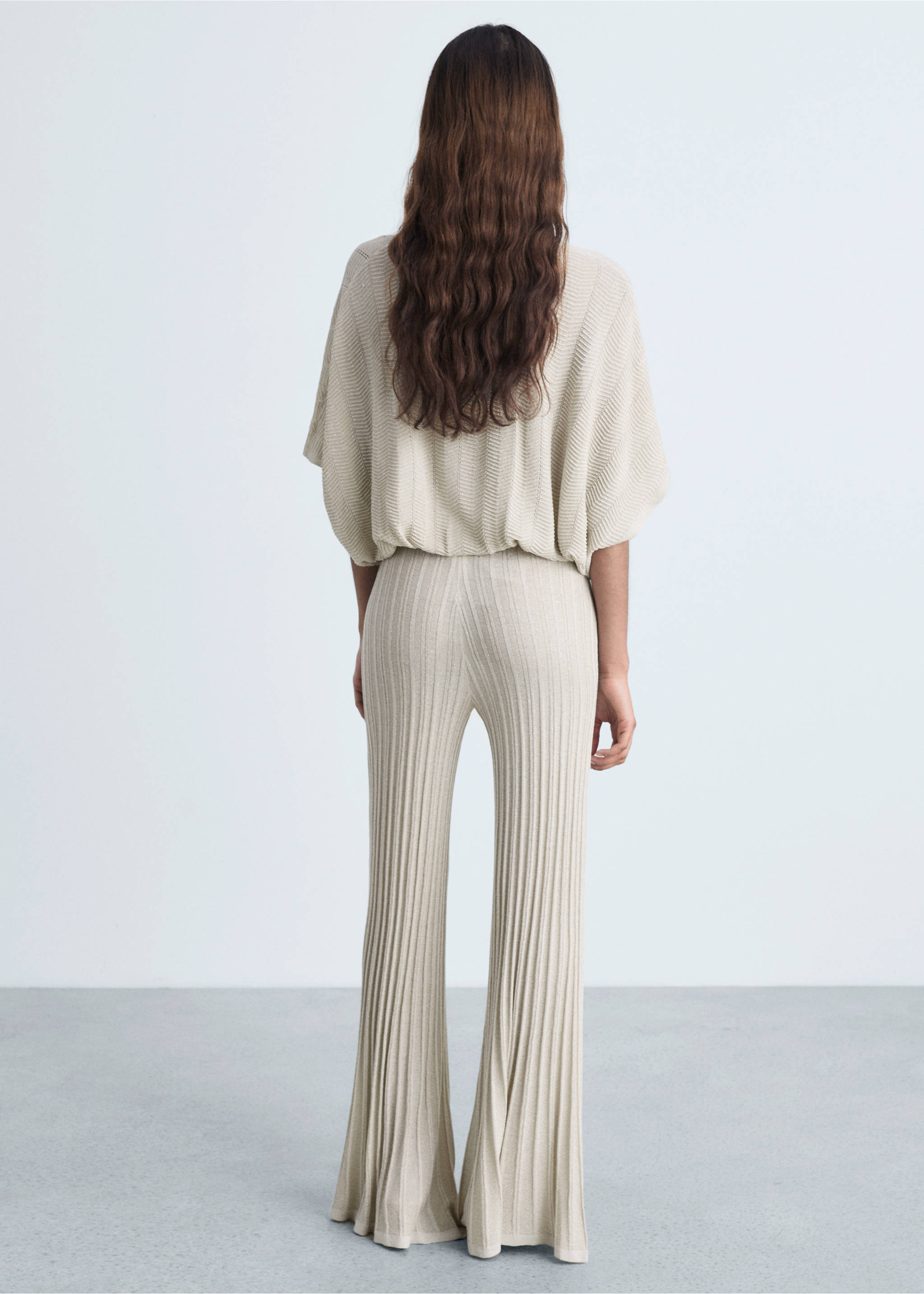 Flared knitted trousers - Reverse of the article, Gold. Ref: 87074063-00.