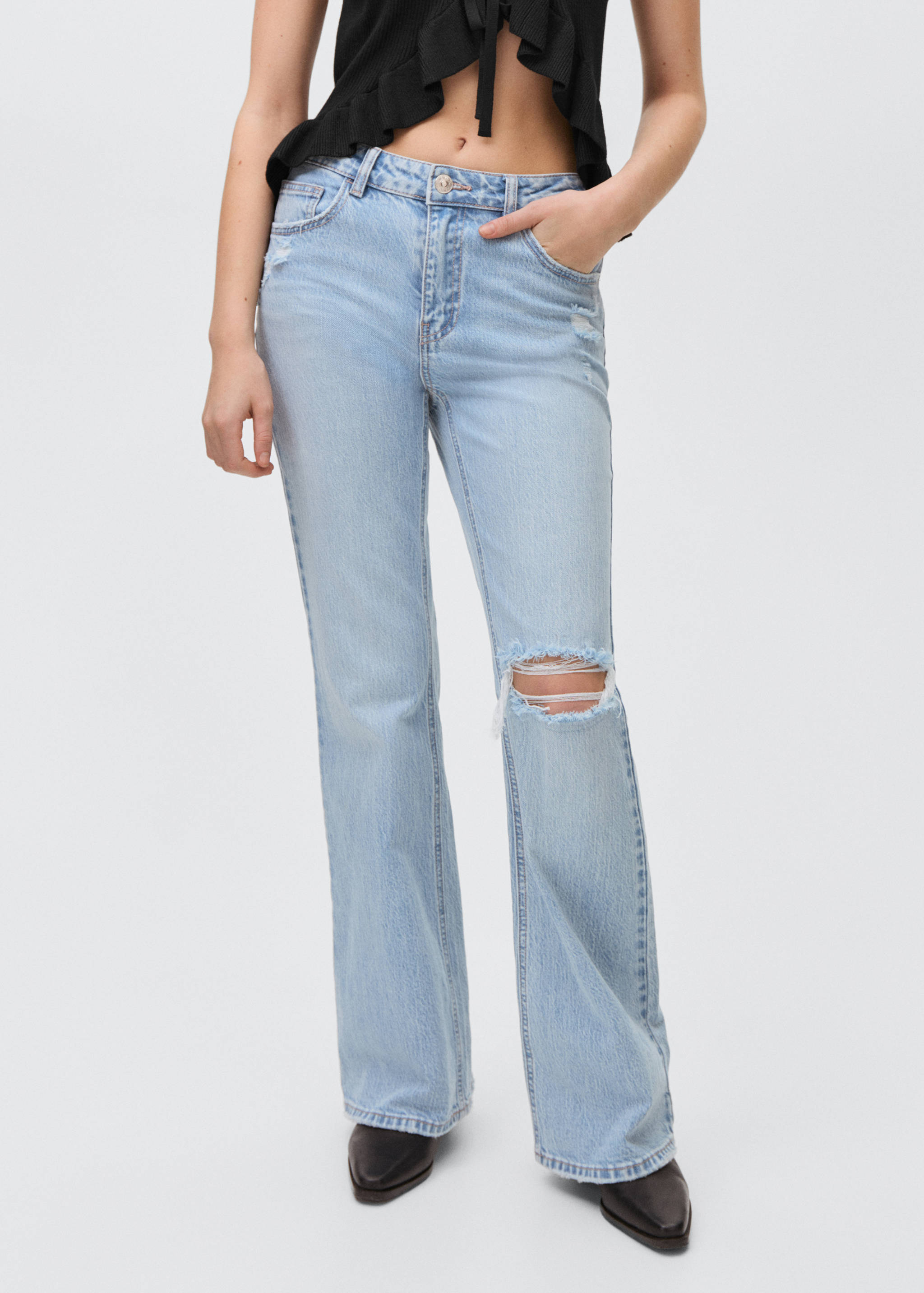 Flared jeans with decorative rips - Medium plane