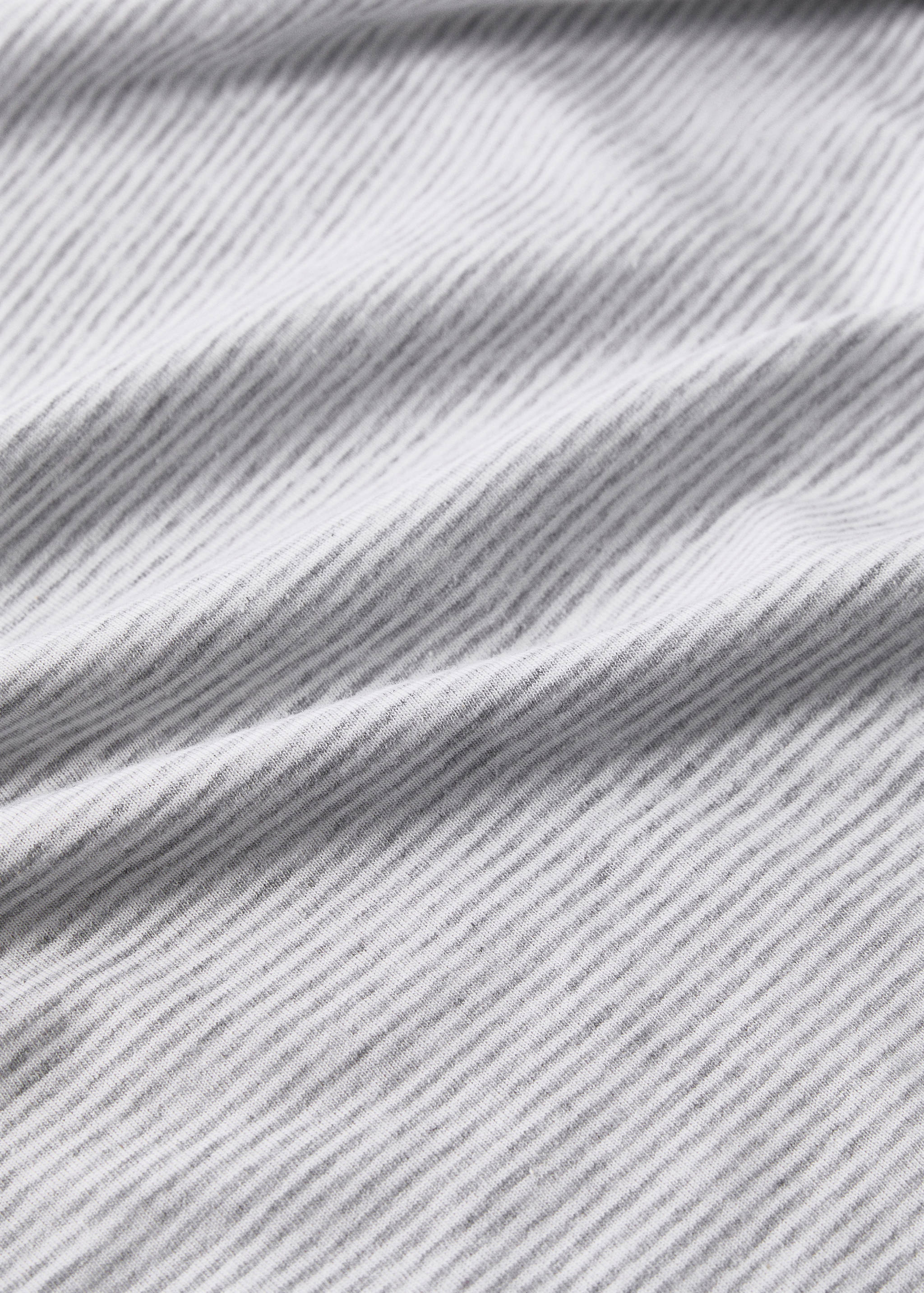 Close-up of a striped grey and white fabric texture.
