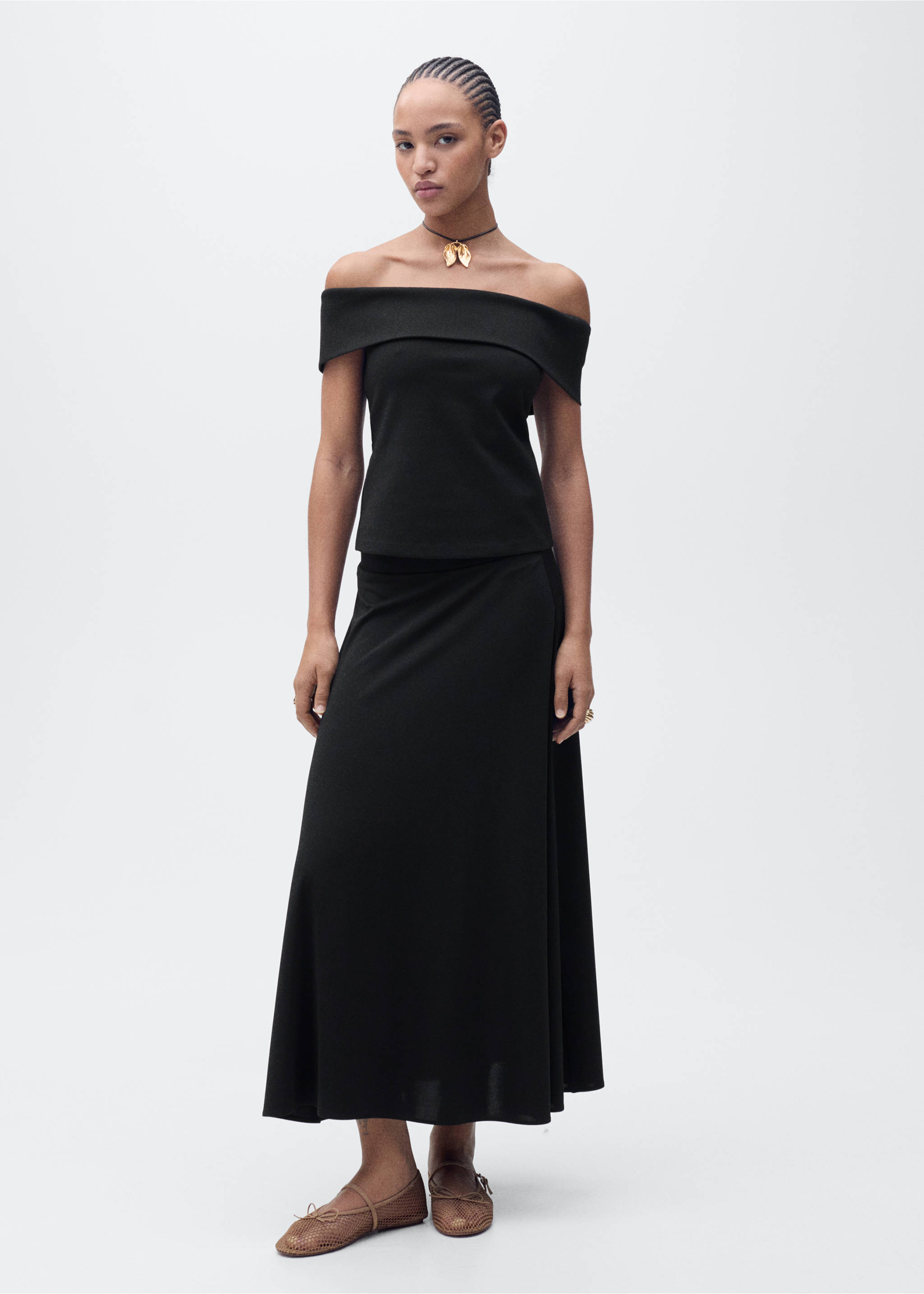 Flared knitted skirt - General plane, Black. Ref: 87075747-00.
