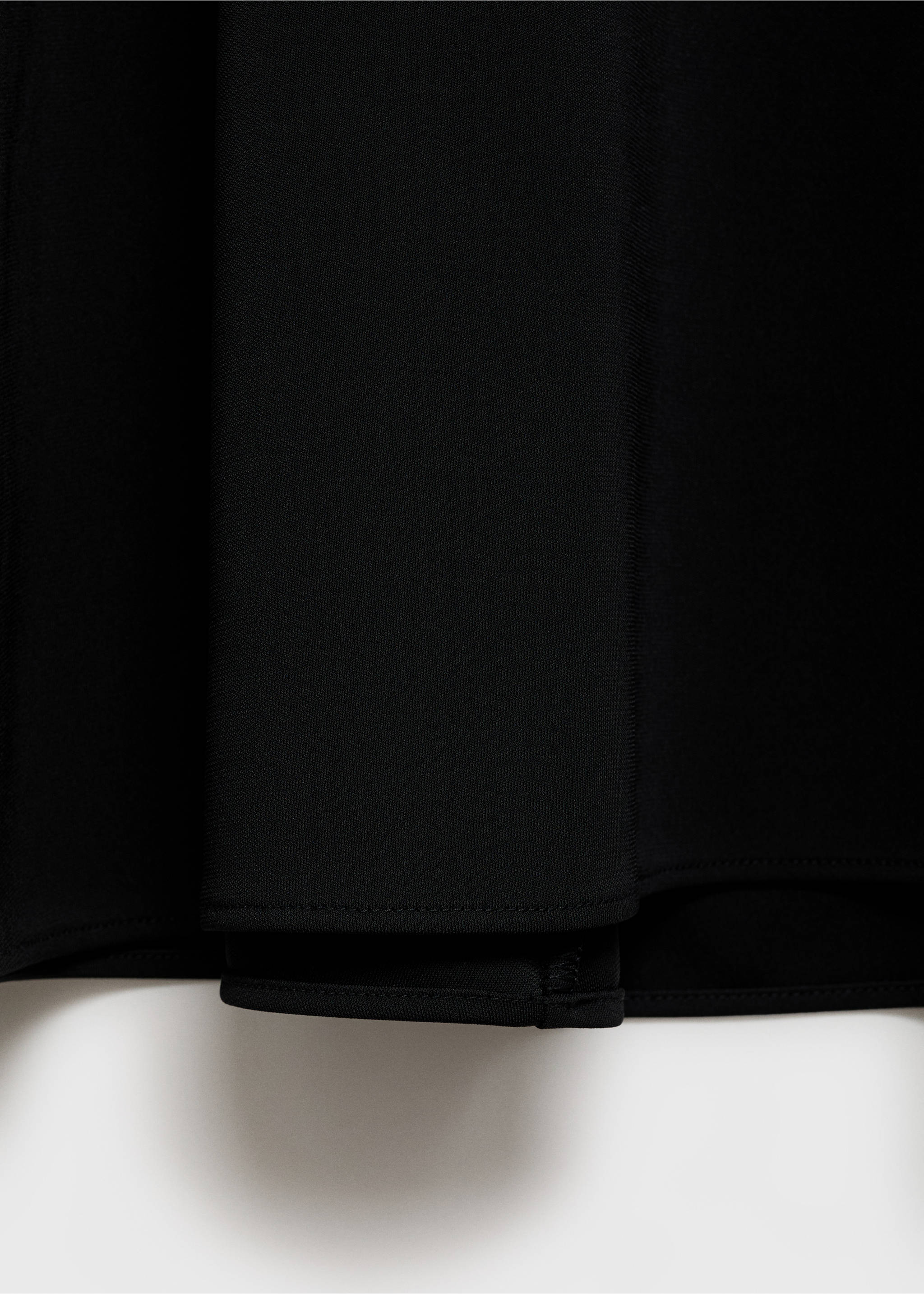 Flared knitted skirt - Details of the article 8, Black. Ref: 87075747-00.