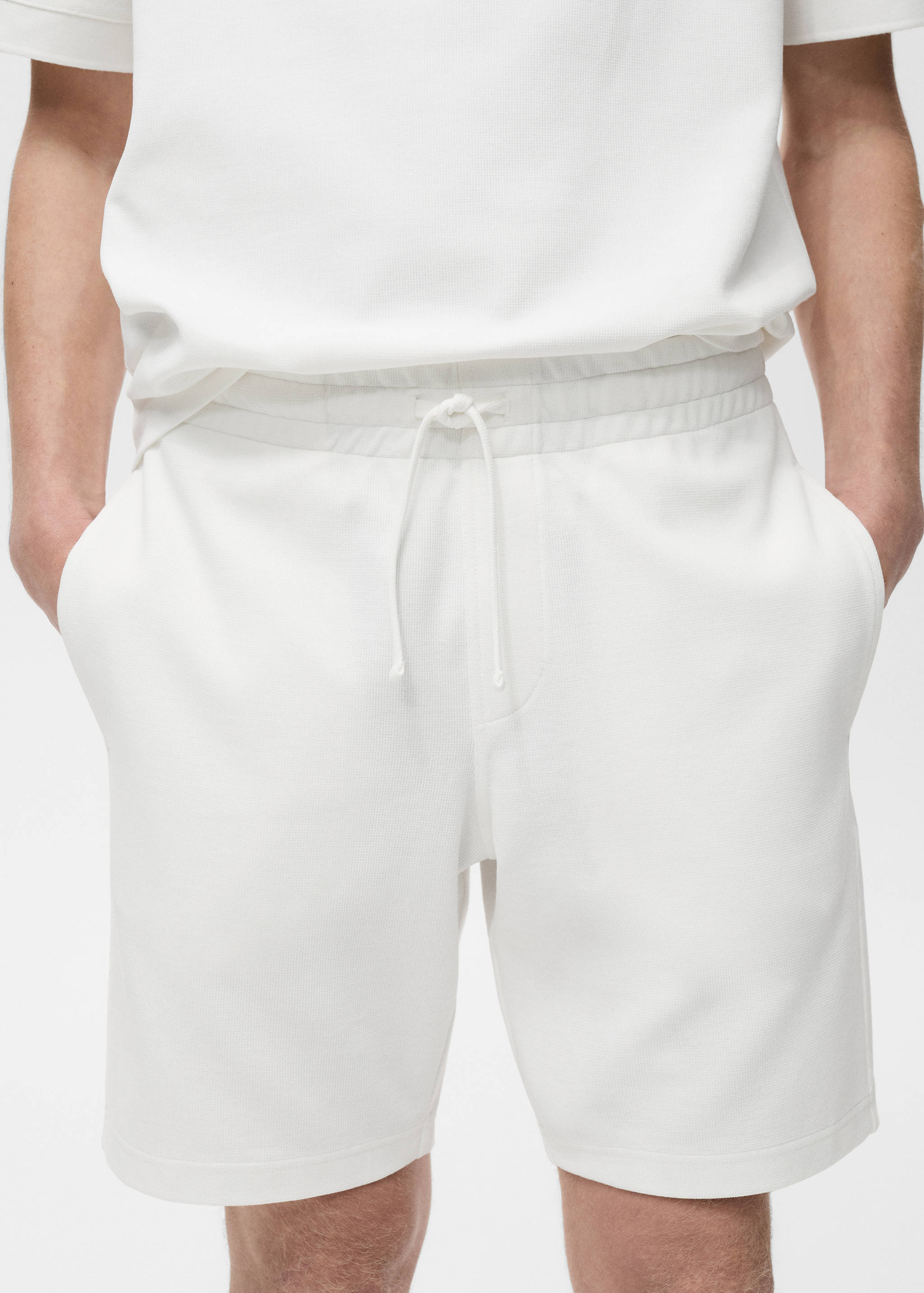 Structured knitted shorts - Details of the article 1