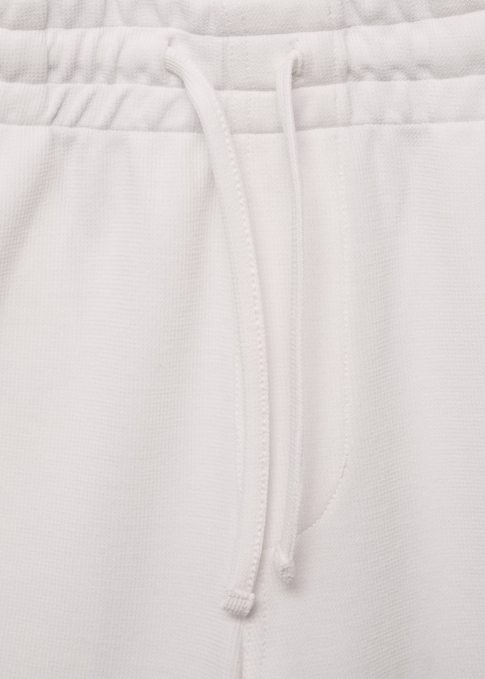 Structured knitted shorts - Details of the article 0