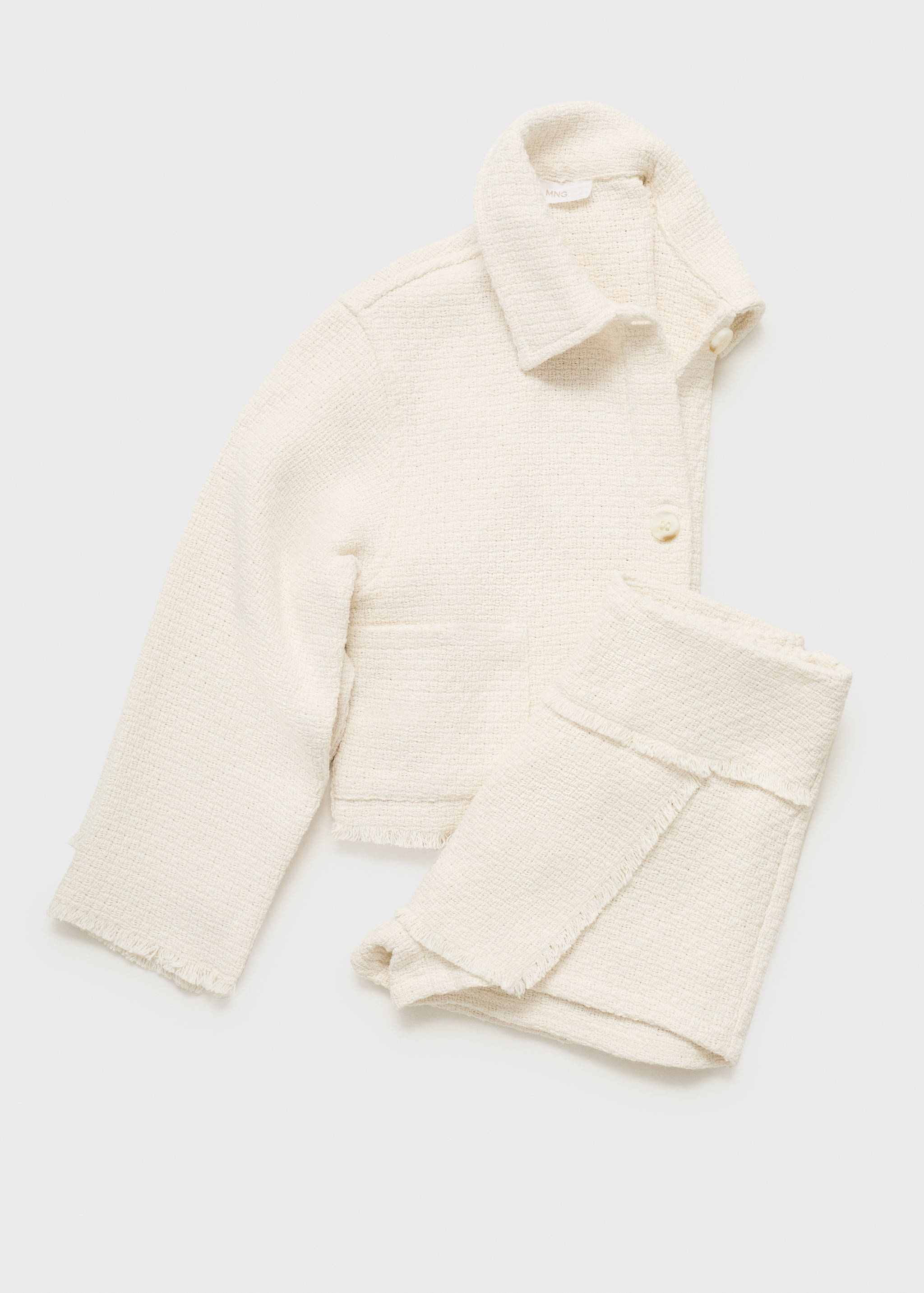 Casaco cropped com textura - Pormenor do artigo 8