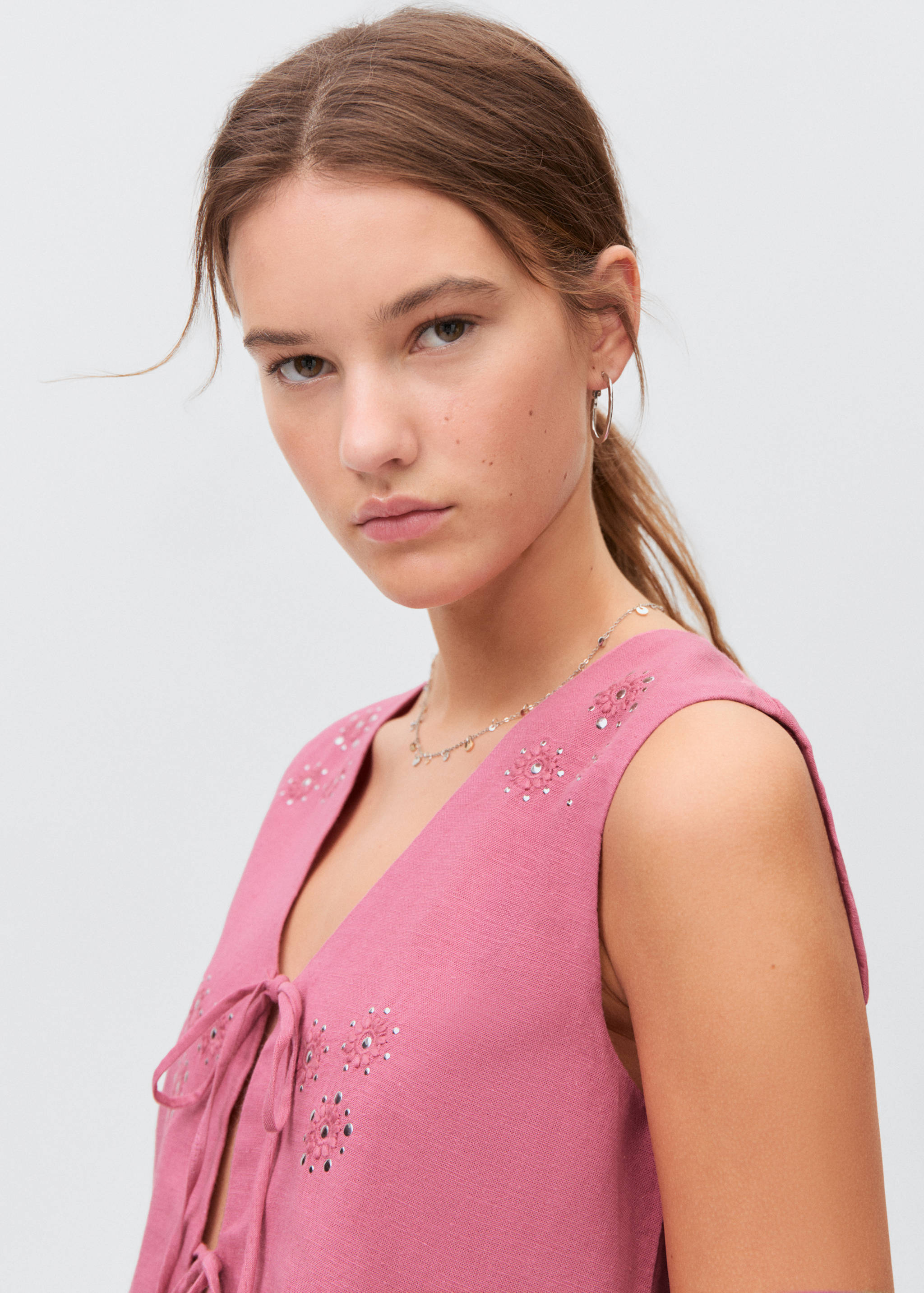 Armilla brodat llaços - Detall de l'article 1