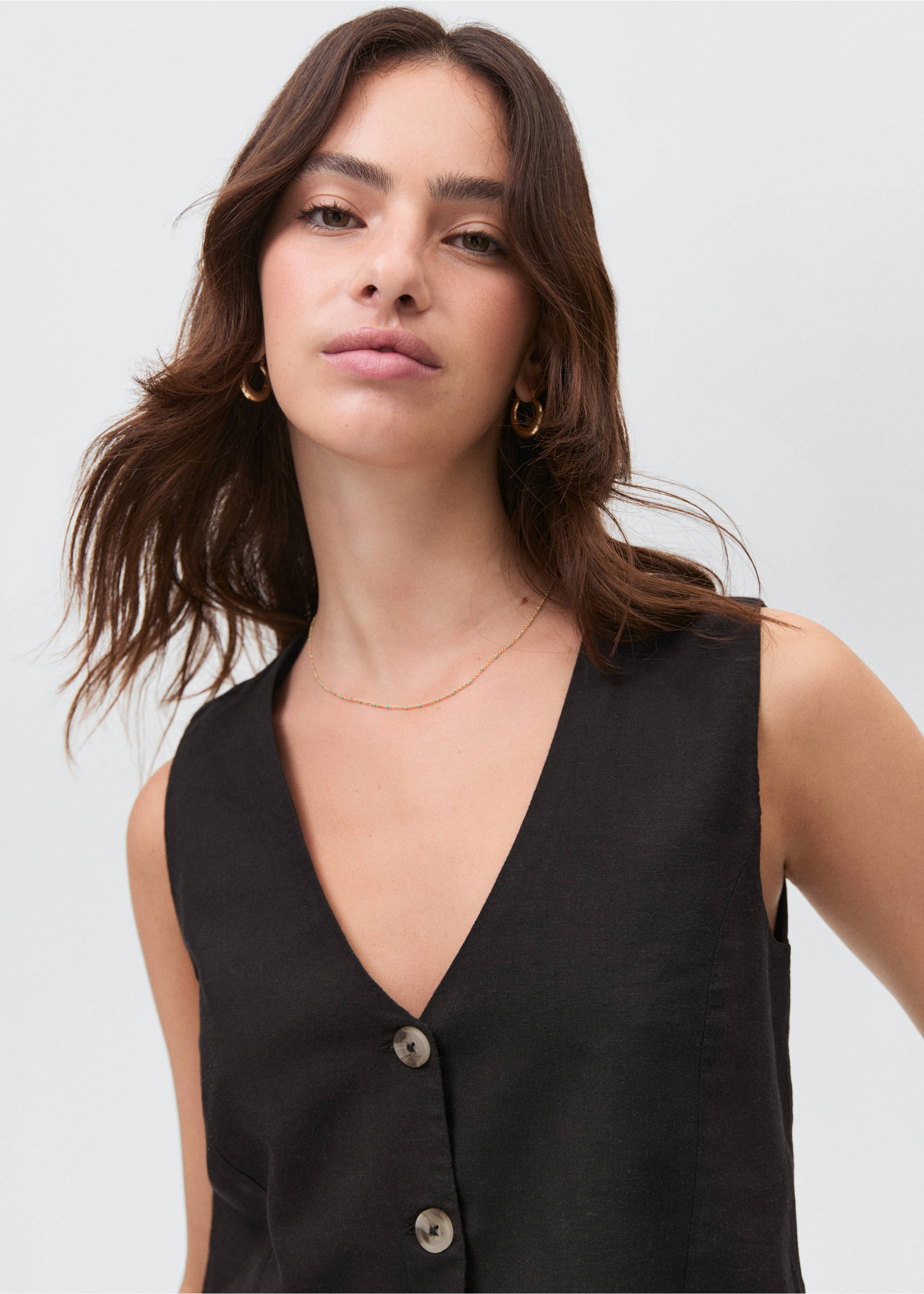 Armilla lli botons - Detall de l'article 1, Negre. Ref: 87076348-00.