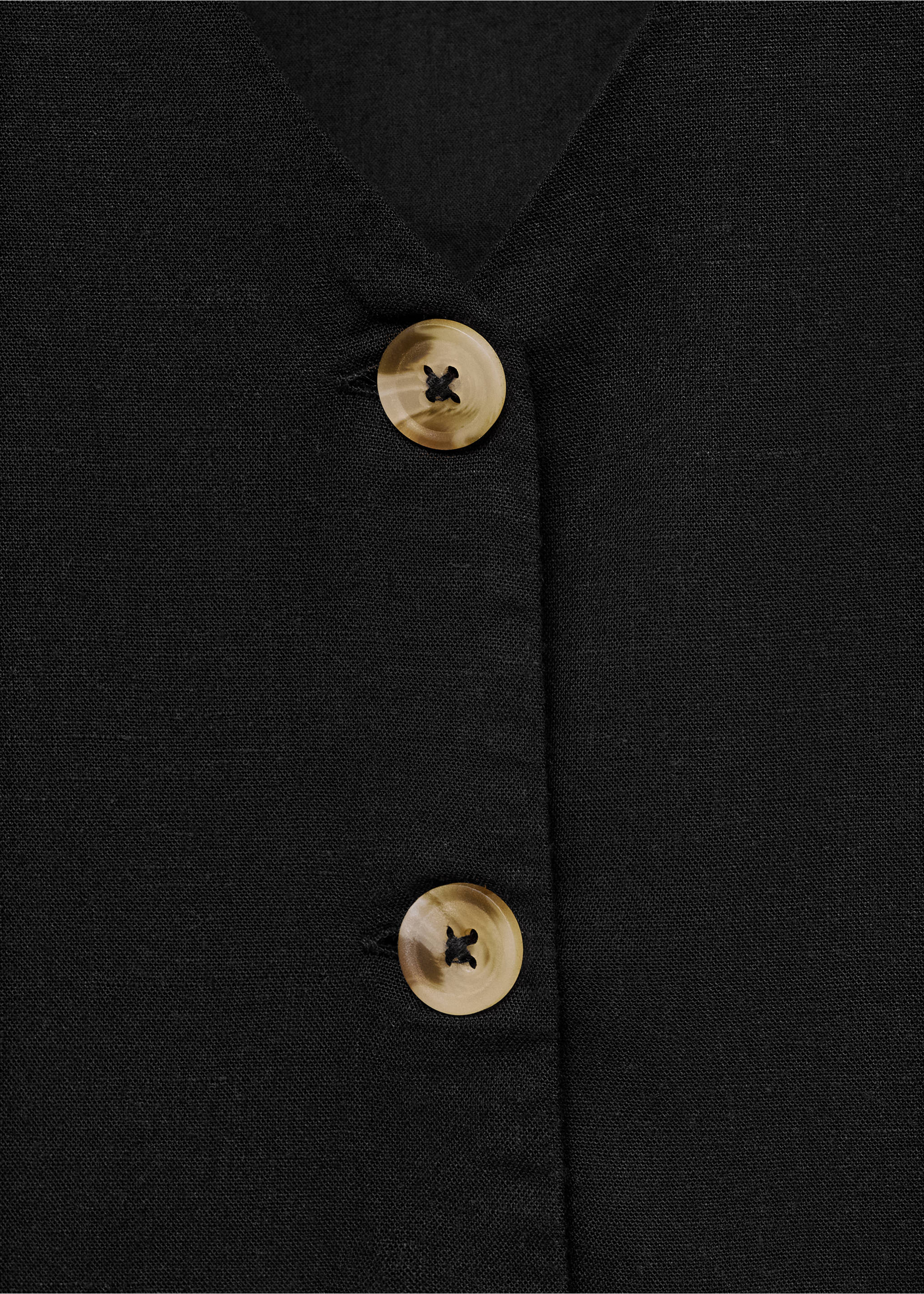 Armilla lli botons - Detall de l'article 8, Negre. Ref: 87076348-00.