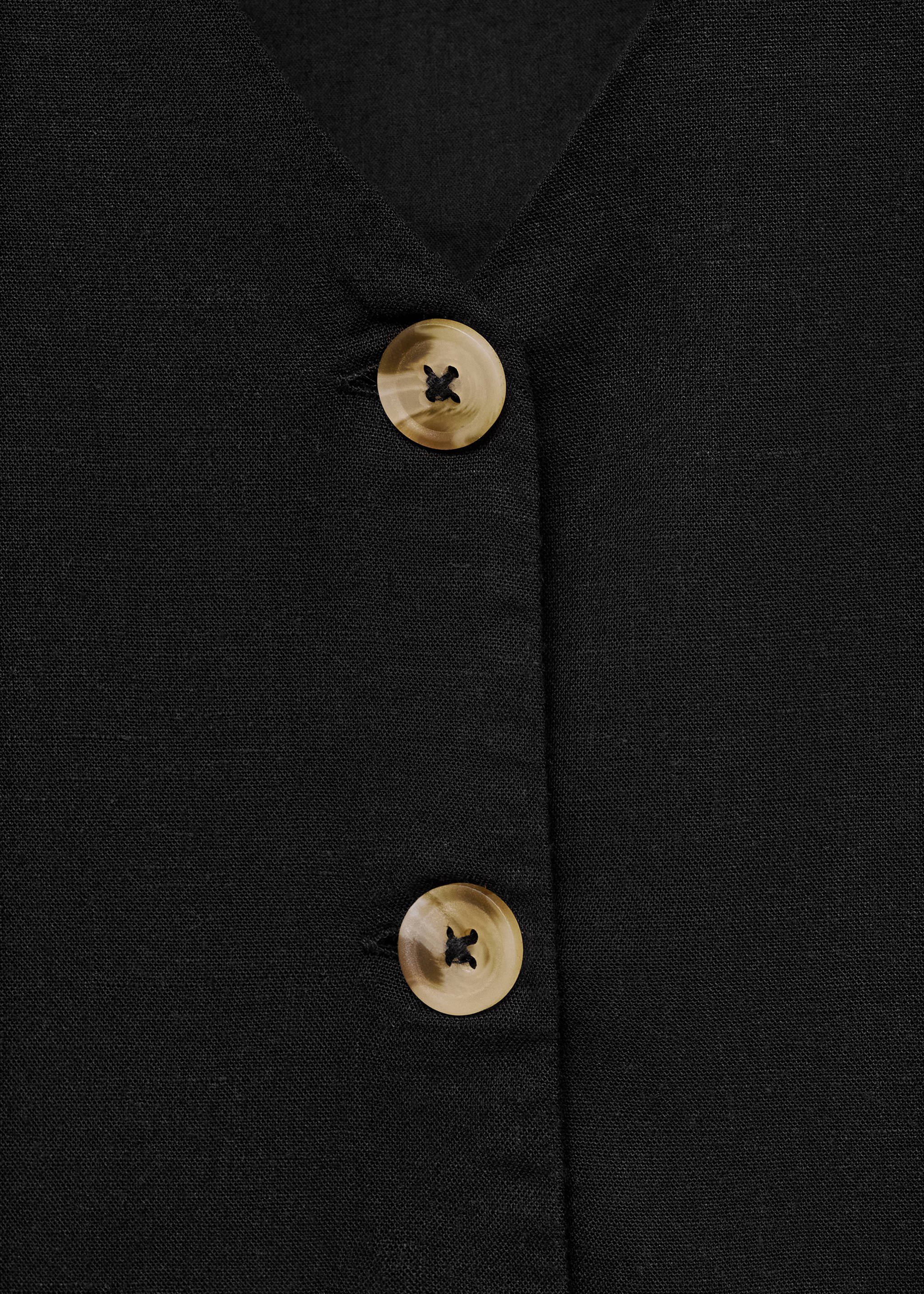 Armilla lli botons - Detall de l'article 8