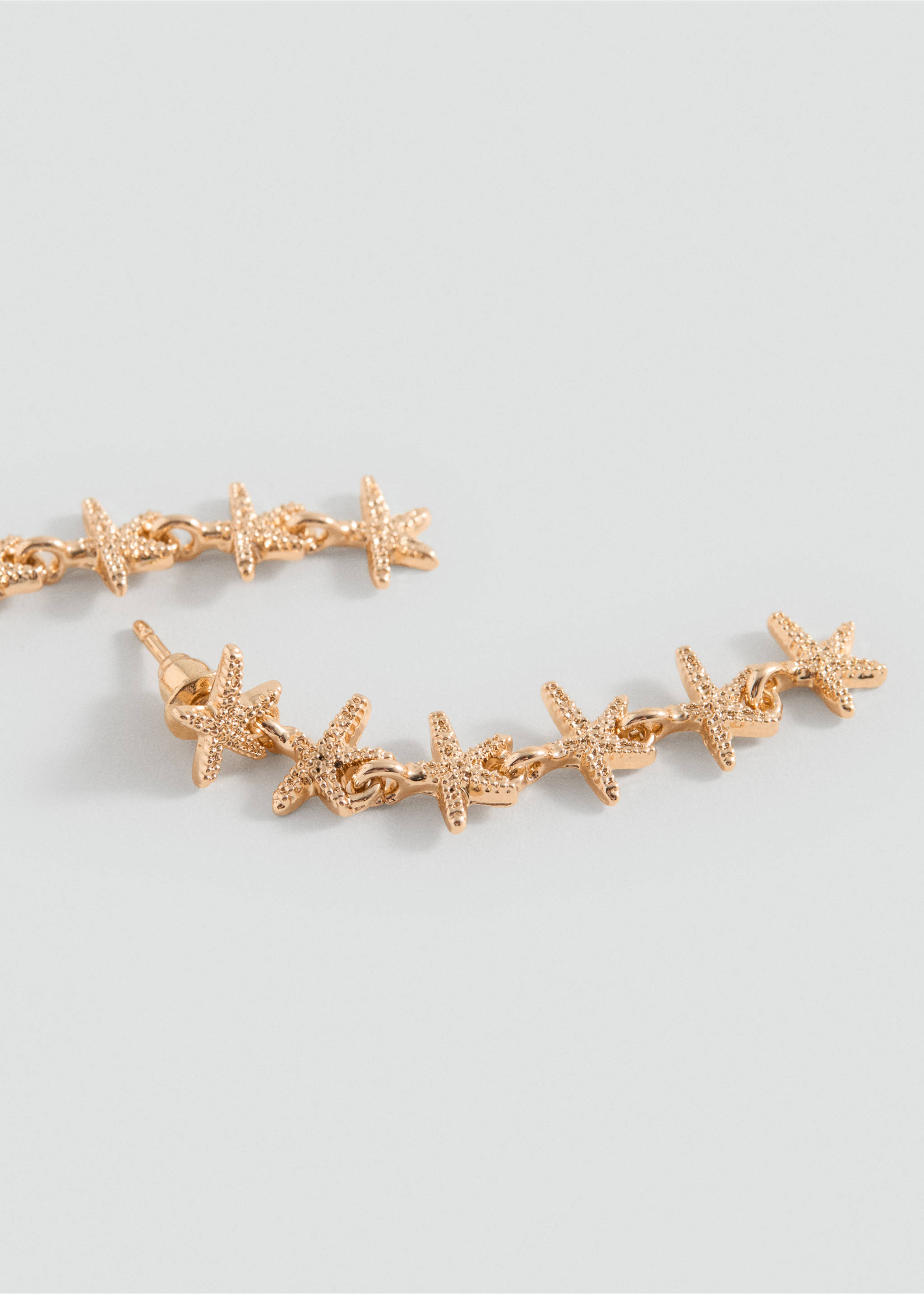 Boucles d'oreilles pendantes étoiles - Plan moyen, Or. Ref: 87076362-00.