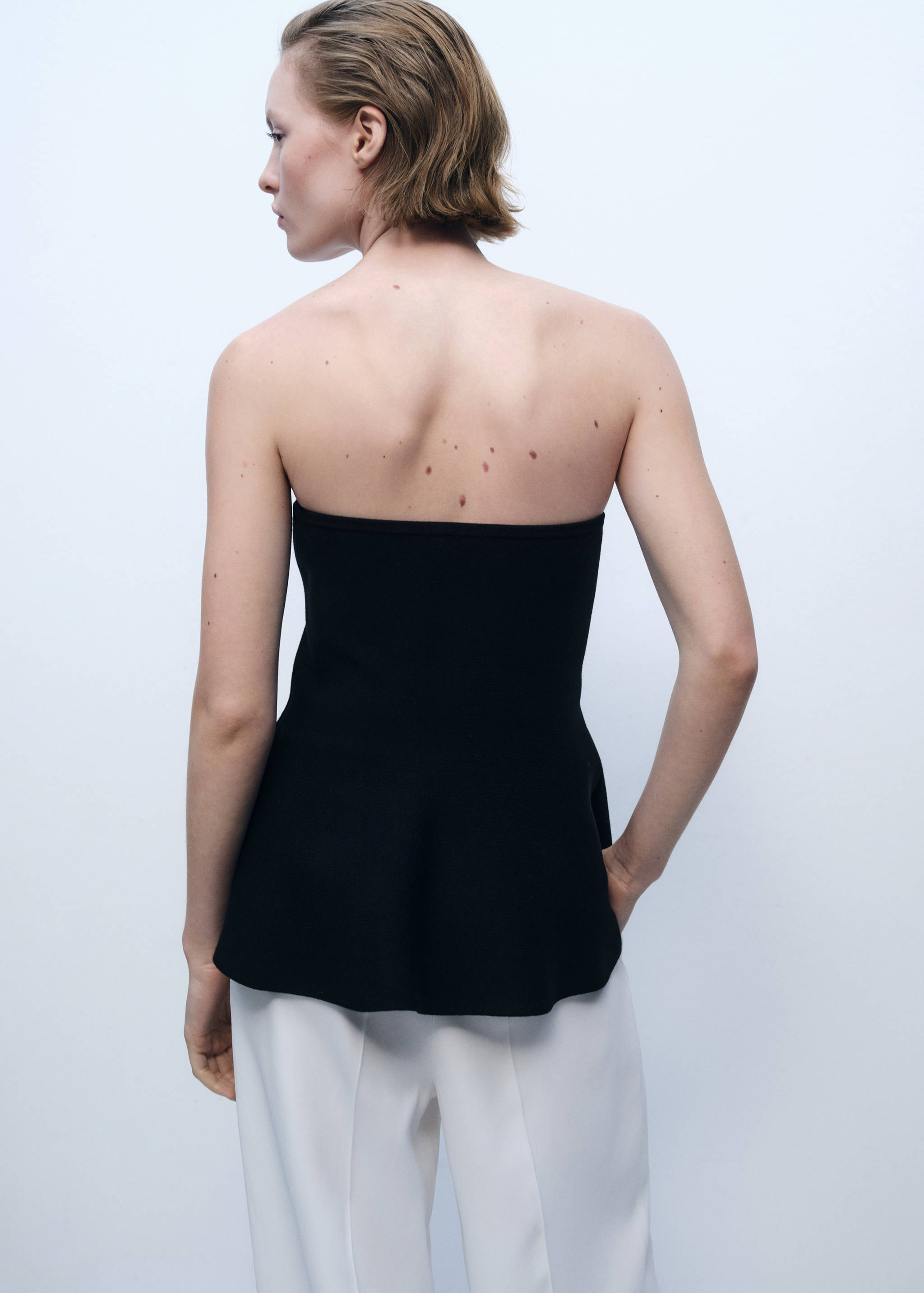 Fine-knit peplum top - Reverse of the article