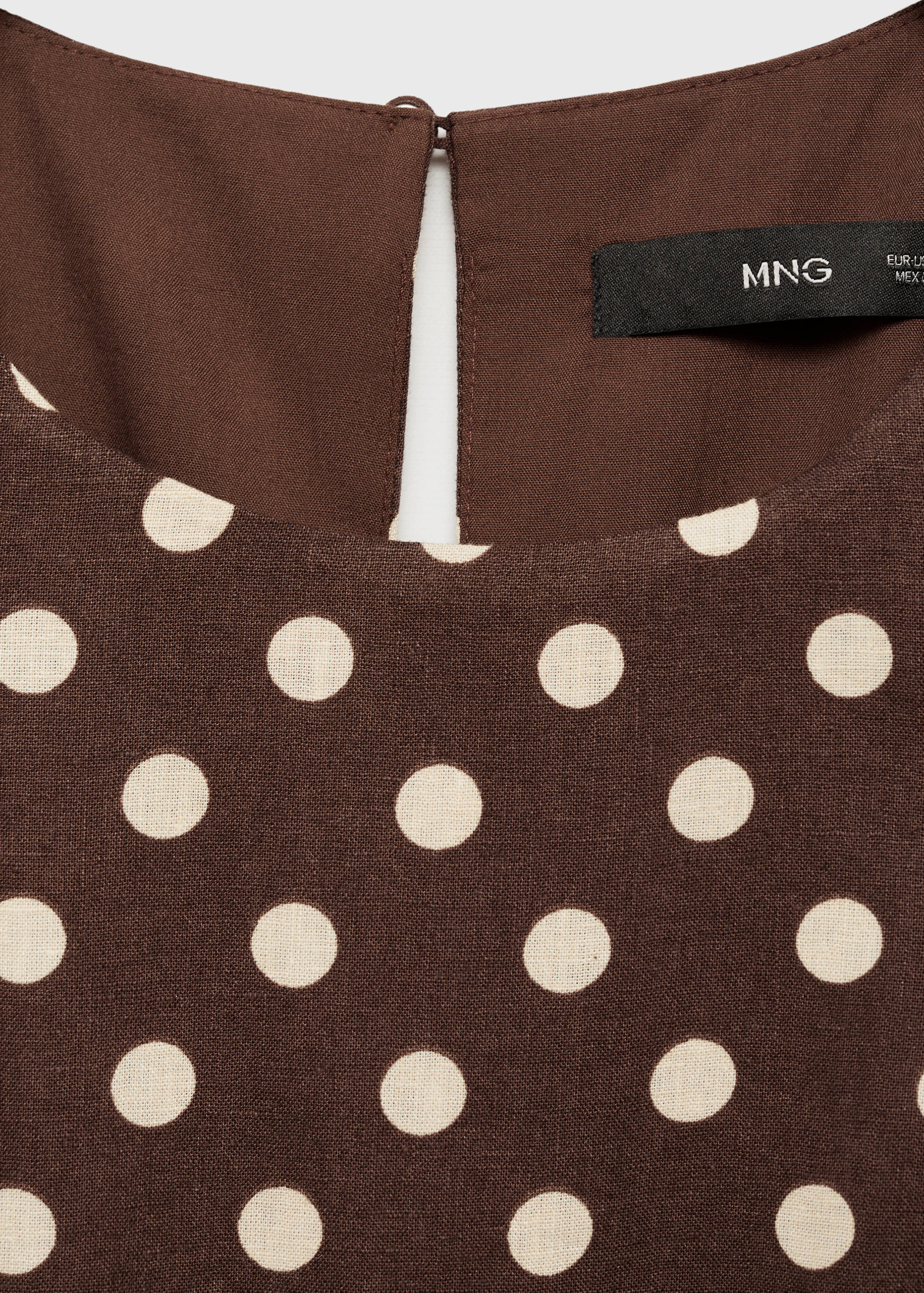 Linen jumpsuit with polka-dots and belt - Details of the article 0