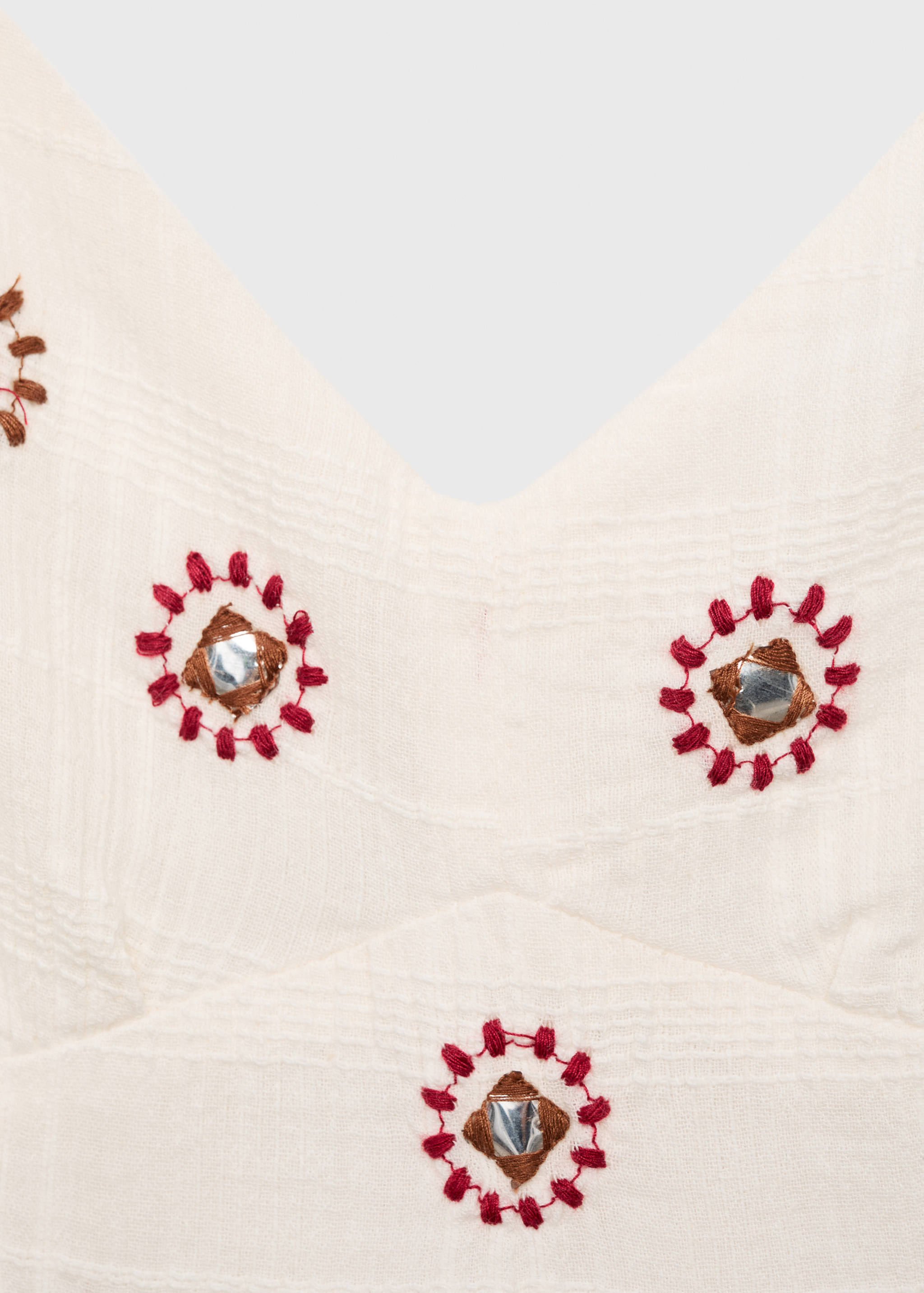 Besticktes Kleid mit aufgesticktem Sonnenmotiv - Detail des Artikels 8
