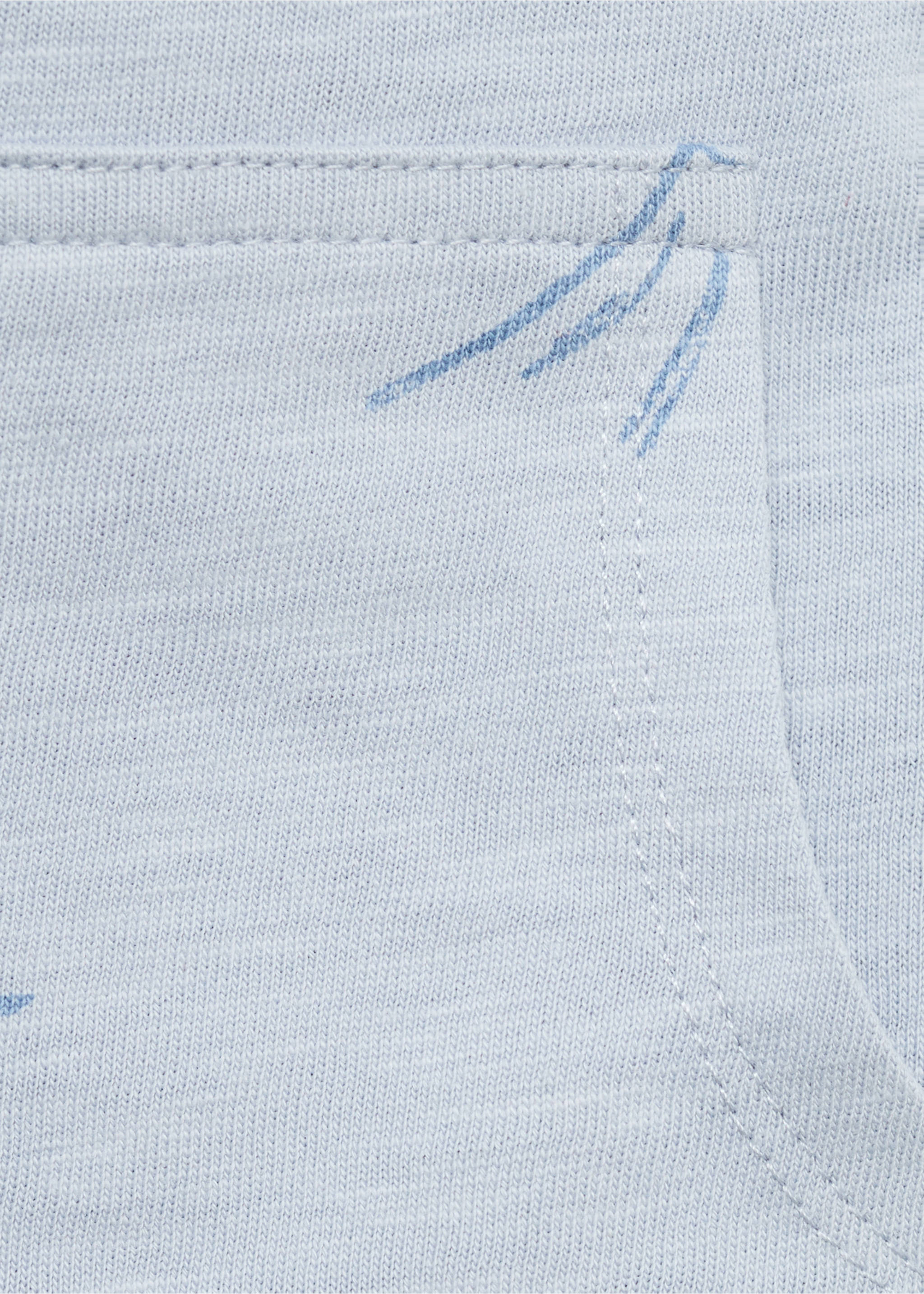 Palm-print dungarees - Details of the article 8, Sky Blue. Ref: 87077703-00.